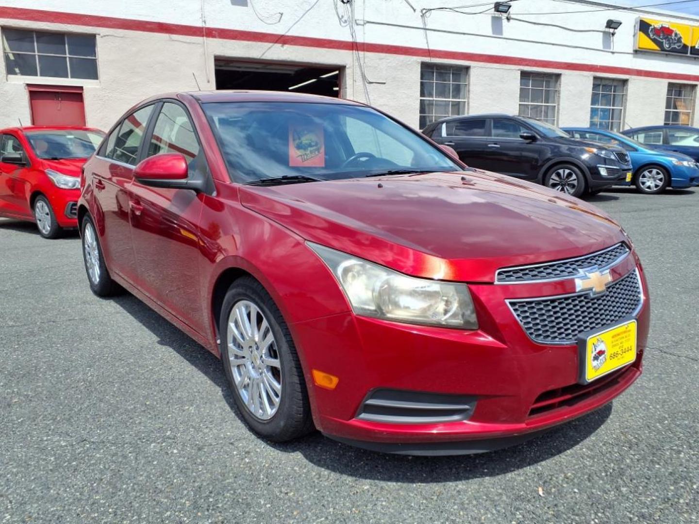 2011 Crystal Red Metallic Tintcoat Chevrolet Cruze ECO (1G1PJ5S97B7) with an 1.4L Ecotec 1.4L Turbo I4 138hp 148ft. lbs. Sequential-Port F.I. engine, 6-Speed Shiftable Automatic transmission, located at 50 Eastern Blvd., Essex, MD, 21221, (410) 686-3444, 39.304367, -76.484947 - Photo#6
