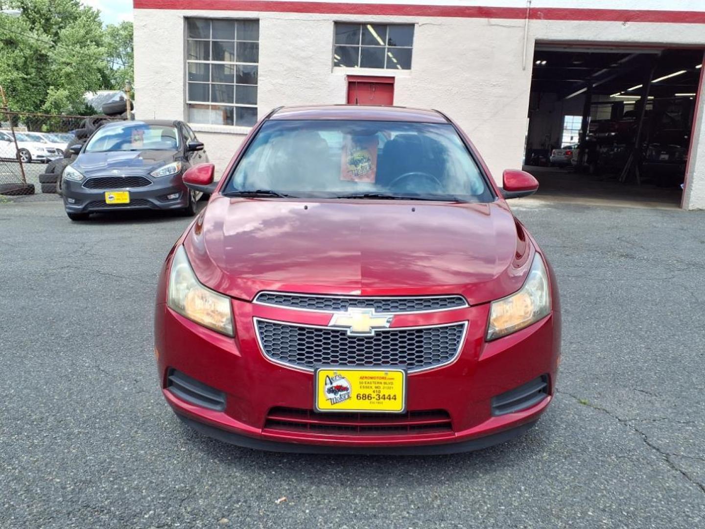 2011 Crystal Red Metallic Tintcoat Chevrolet Cruze ECO (1G1PJ5S97B7) with an 1.4L Ecotec 1.4L Turbo I4 138hp 148ft. lbs. Sequential-Port F.I. engine, 6-Speed Shiftable Automatic transmission, located at 50 Eastern Blvd., Essex, MD, 21221, (410) 686-3444, 39.304367, -76.484947 - Photo#7