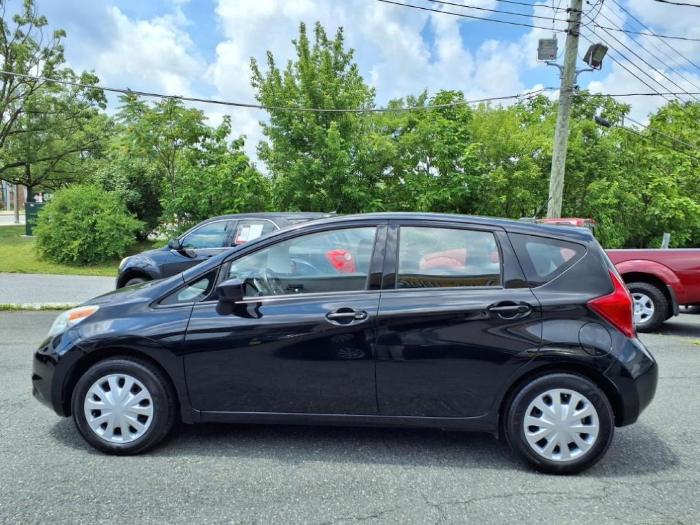 2016 Super Black Nissan Versa Note SV (3N1CE2CP7GL) with an 1.6L 1.6L I4 109hp 107ft. lbs. Sequential-Port F.I. engine, CVT transmission, located at 50 Eastern Blvd., Essex, MD, 21221, (410) 686-3444, 39.304367, -76.484947 - Photo#1