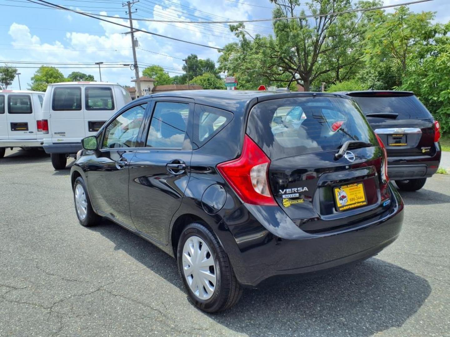 2016 Super Black Nissan Versa Note SV (3N1CE2CP7GL) with an 1.6L 1.6L I4 109hp 107ft. lbs. Sequential-Port F.I. engine, CVT transmission, located at 50 Eastern Blvd., Essex, MD, 21221, (410) 686-3444, 39.304367, -76.484947 - Photo#2