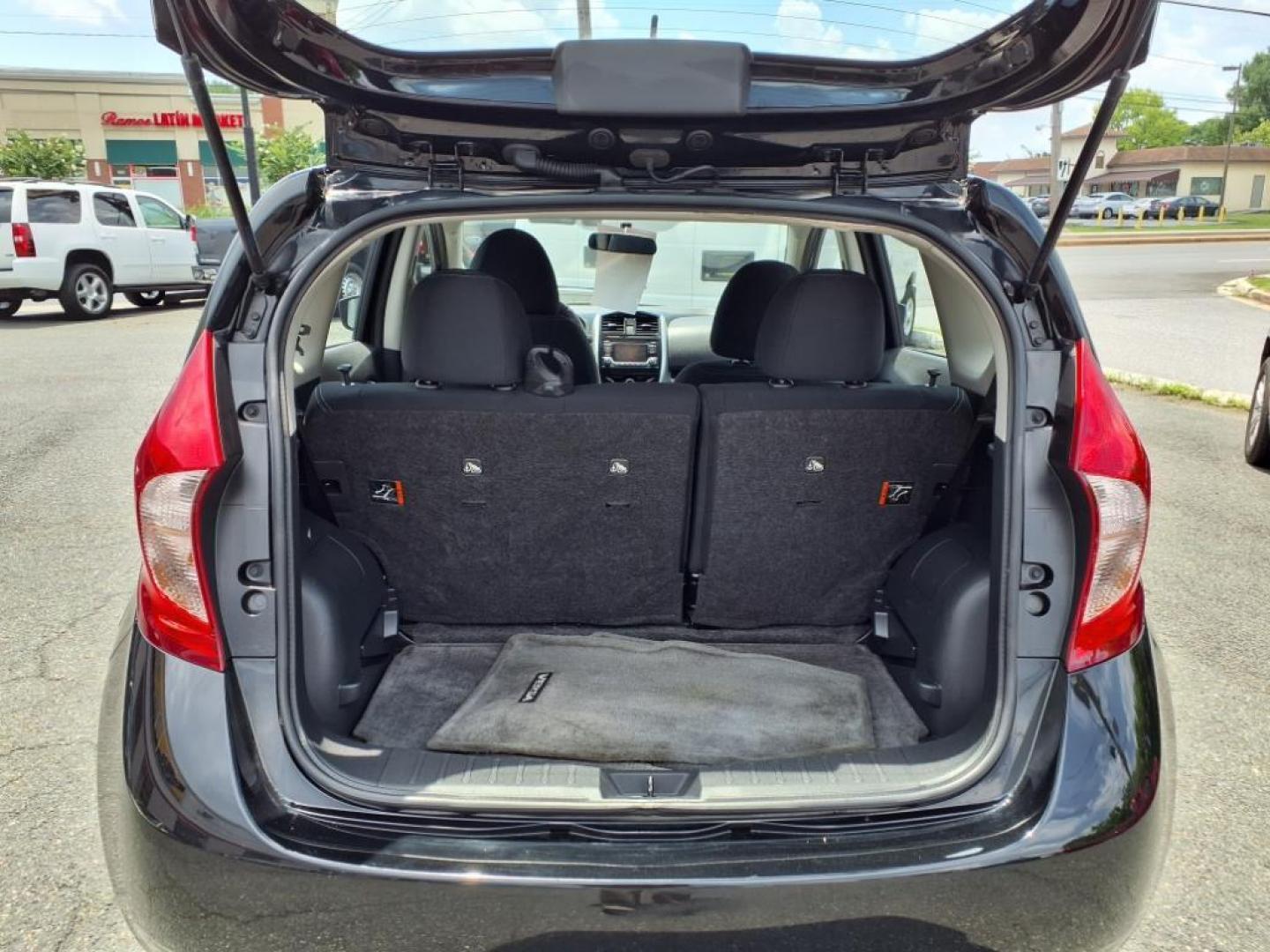 2016 Super Black Nissan Versa Note SV (3N1CE2CP7GL) with an 1.6L 1.6L I4 109hp 107ft. lbs. Sequential-Port F.I. engine, CVT transmission, located at 50 Eastern Blvd., Essex, MD, 21221, (410) 686-3444, 39.304367, -76.484947 - Photo#4
