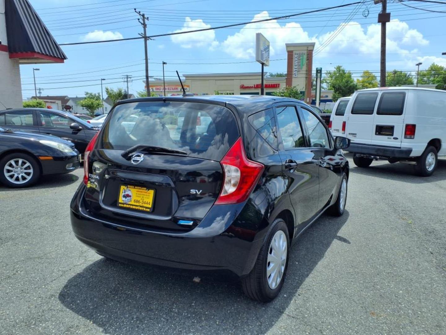 2016 Super Black Nissan Versa Note SV (3N1CE2CP7GL) with an 1.6L 1.6L I4 109hp 107ft. lbs. Sequential-Port F.I. engine, CVT transmission, located at 50 Eastern Blvd., Essex, MD, 21221, (410) 686-3444, 39.304367, -76.484947 - Photo#5
