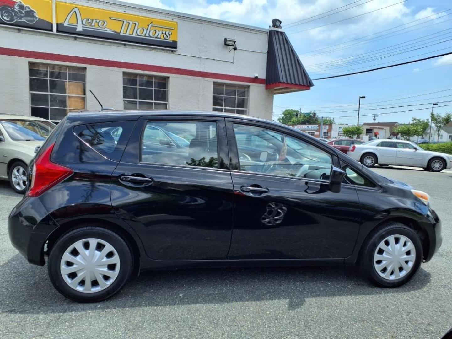 2016 Super Black Nissan Versa Note SV (3N1CE2CP7GL) with an 1.6L 1.6L I4 109hp 107ft. lbs. Sequential-Port F.I. engine, CVT transmission, located at 50 Eastern Blvd., Essex, MD, 21221, (410) 686-3444, 39.304367, -76.484947 - Photo#6