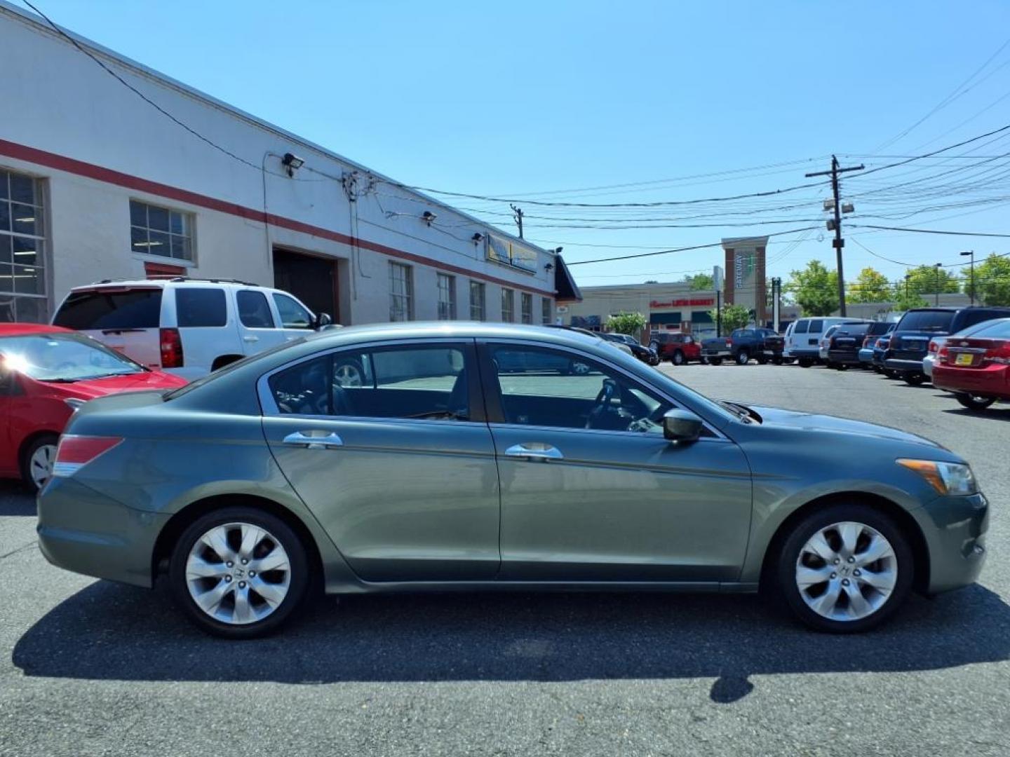2009 Mystic Green Metallic Honda Accord EX-L V6 w/Navi (1HGCP368X9A) with an 3.5L 3.5L V6 271hp 254ft. lbs. Sequential-Port F.I. engine, 5-Speed Automatic transmission, located at 50 Eastern Blvd., Essex, MD, 21221, (410) 686-3444, 39.304367, -76.484947 - Photo#4