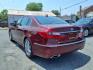 2013 Red Hyundai Genesis (KMHGC4DD2DU) with an 3.8L 6 Cylinder Fuel Injected engine, V6 transmission, located at 50 Eastern Blvd., Essex, MD, 21221, (410) 686-3444, 39.304367, -76.484947 - Photo#2
