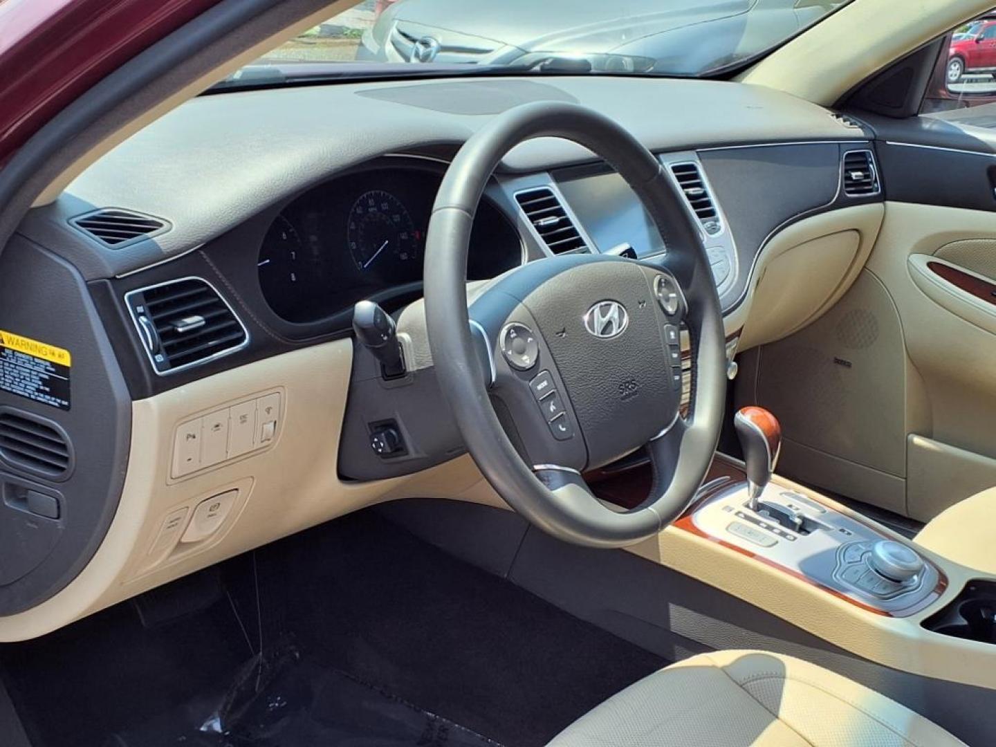 2013 Red Hyundai Genesis (KMHGC4DD2DU) with an 3.8L 6 Cylinder Fuel Injected engine, V6 transmission, located at 50 Eastern Blvd., Essex, MD, 21221, (410) 686-3444, 39.304367, -76.484947 - Photo#10