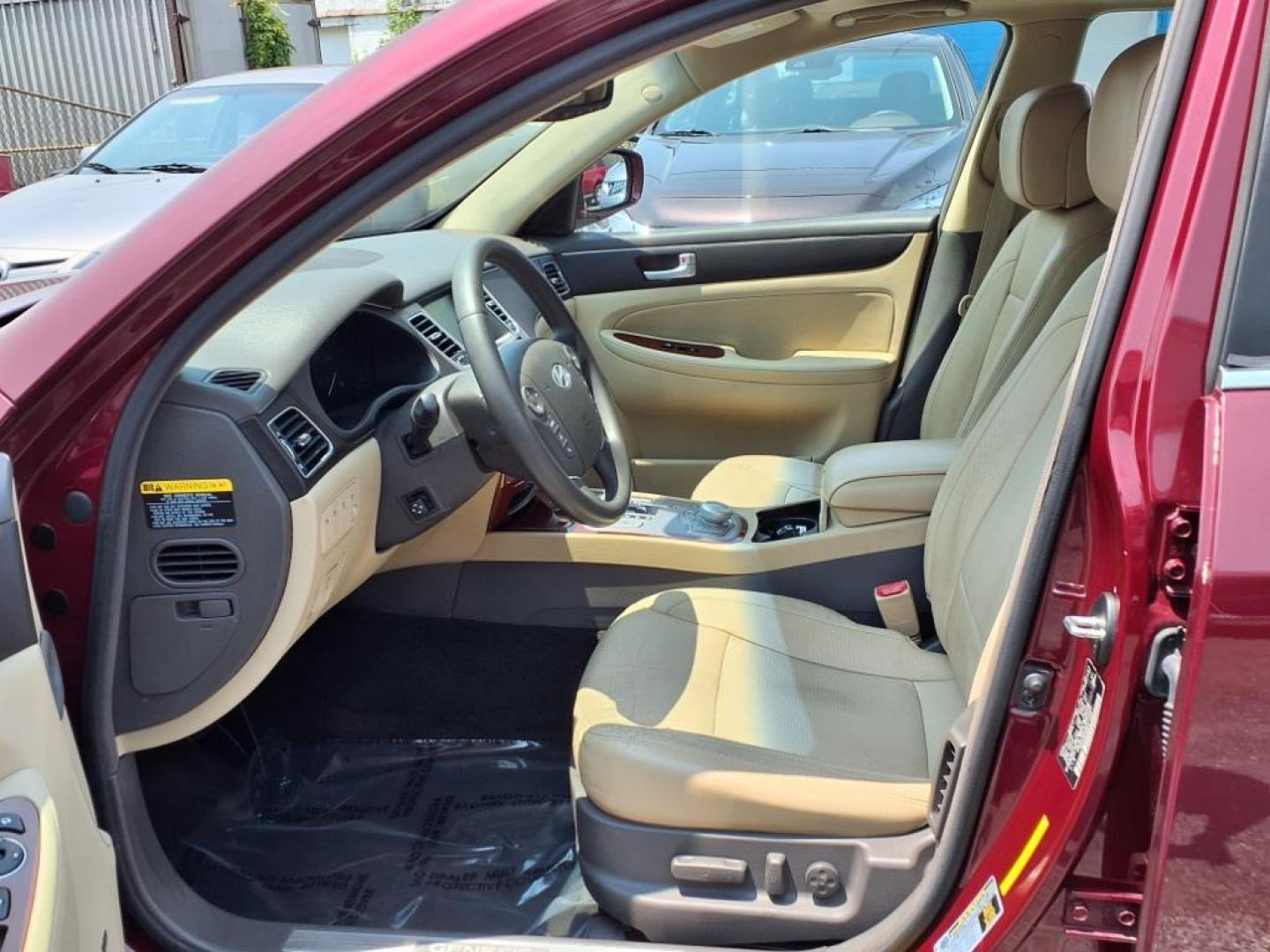 2013 Red Hyundai Genesis (KMHGC4DD2DU) with an 3.8L 6 Cylinder Fuel Injected engine, V6 transmission, located at 50 Eastern Blvd., Essex, MD, 21221, (410) 686-3444, 39.304367, -76.484947 - Photo#11