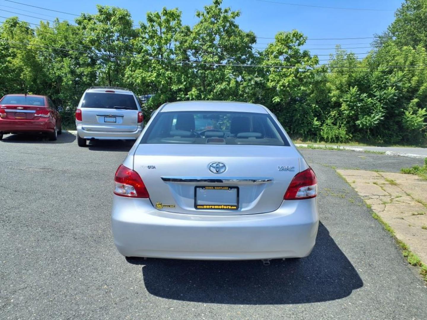 2009 Silver Streak Mica Toyota Yaris Base (JTDBT903591) with an 1.5L 1.5L I4 106hp 103ft. lbs. Sequential-Port F.I. engine, 4-Speed Automatic transmission, located at 50 Eastern Blvd., Essex, MD, 21221, (410) 686-3444, 39.304367, -76.484947 - Photo#3
