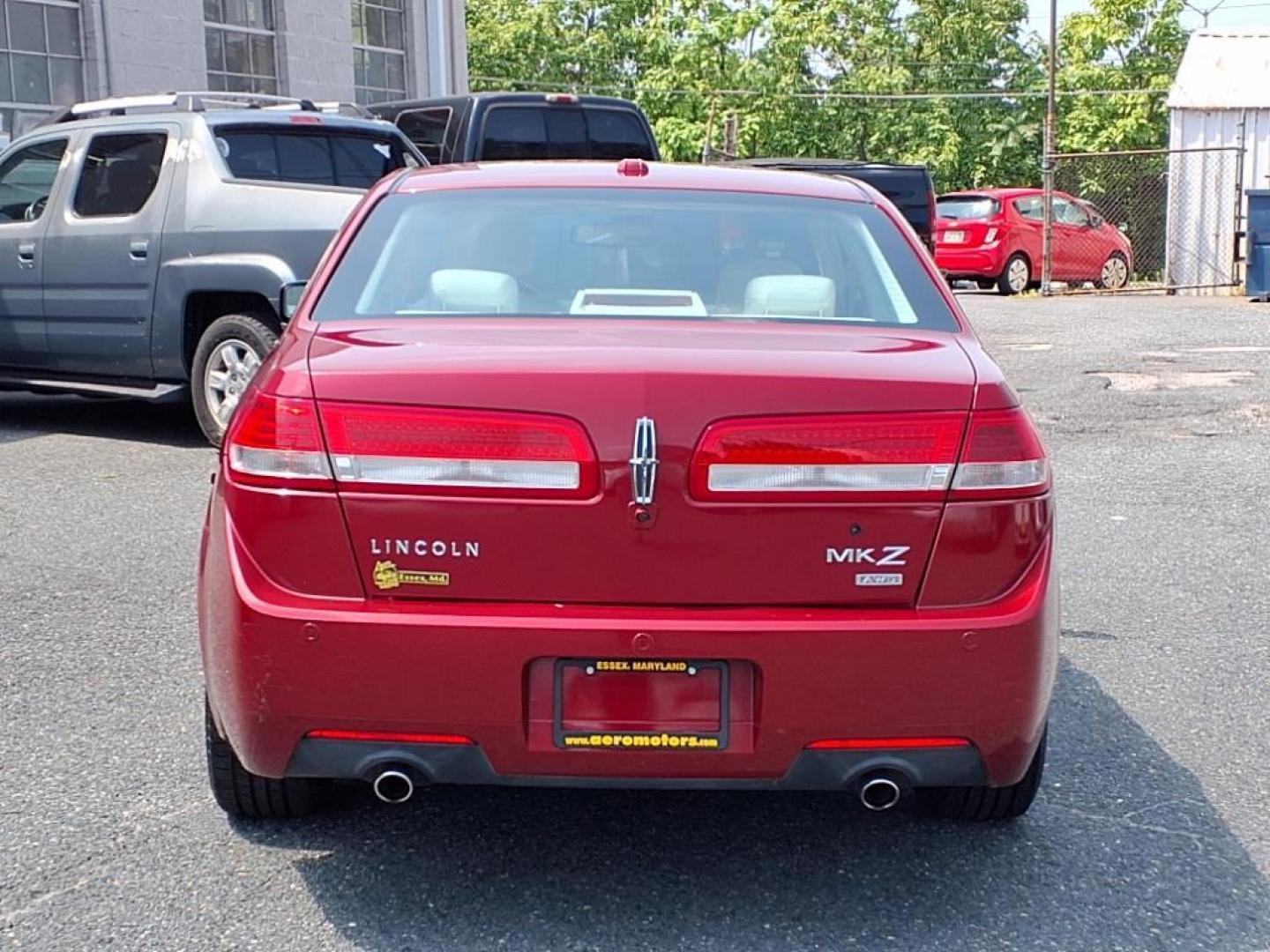 2010 Sangria Red Clearcoat Metallic Lincoln MKZ Base (3LNHL2JC6AR) with an 3.5L Duratec 3.5L V6 263hp 249ft. lbs. Sequential-Port F.I. engine, 6-Speed Shiftable Automatic transmission, located at 50 Eastern Blvd., Essex, MD, 21221, (410) 686-3444, 39.304367, -76.484947 - Photo#3