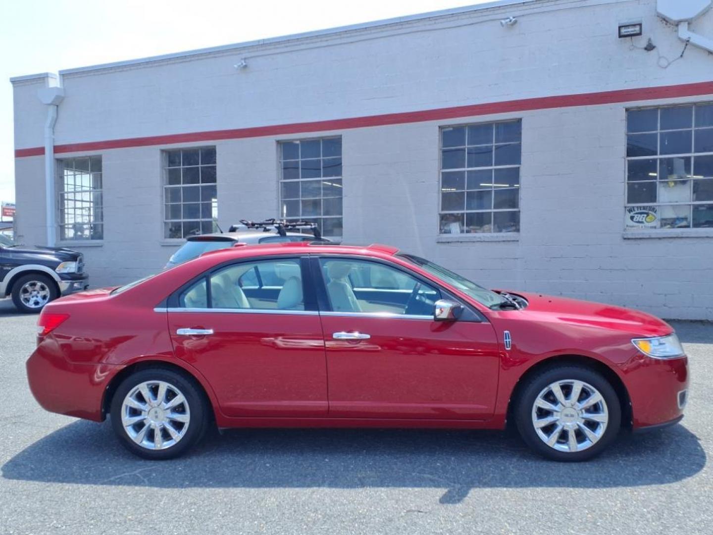 2010 Sangria Red Clearcoat Metallic Lincoln MKZ Base (3LNHL2JC6AR) with an 3.5L Duratec 3.5L V6 263hp 249ft. lbs. Sequential-Port F.I. engine, 6-Speed Shiftable Automatic transmission, located at 50 Eastern Blvd., Essex, MD, 21221, (410) 686-3444, 39.304367, -76.484947 - Photo#5