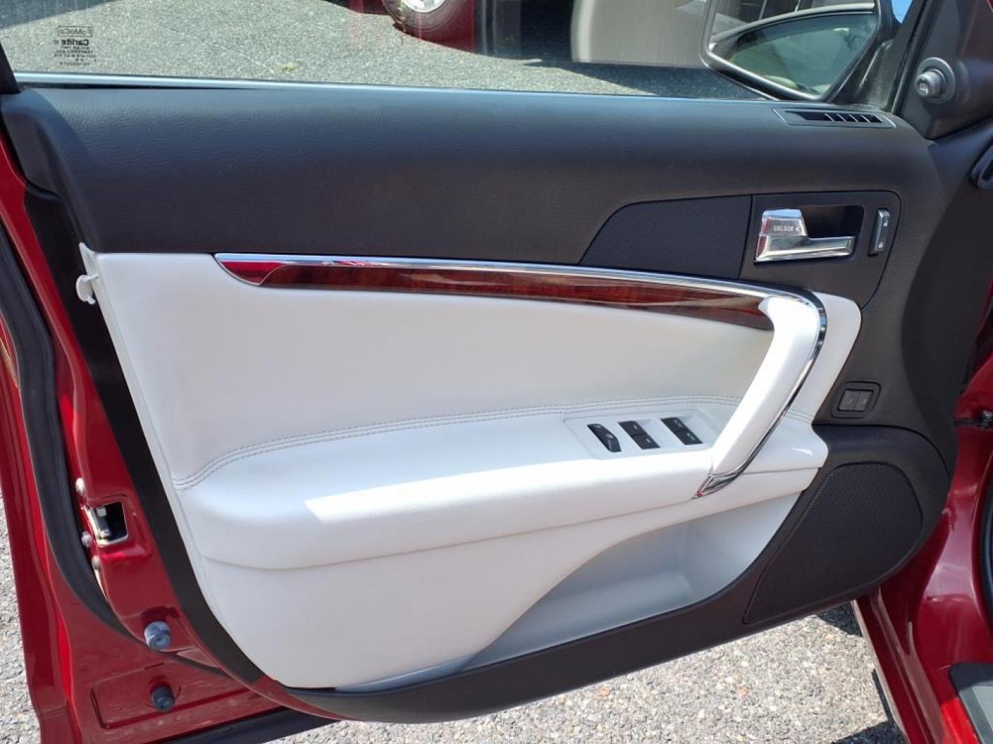 2010 Sangria Red Clearcoat Metallic Lincoln MKZ Base (3LNHL2JC6AR) with an 3.5L Duratec 3.5L V6 263hp 249ft. lbs. Sequential-Port F.I. engine, 6-Speed Shiftable Automatic transmission, located at 50 Eastern Blvd., Essex, MD, 21221, (410) 686-3444, 39.304367, -76.484947 - Photo#9