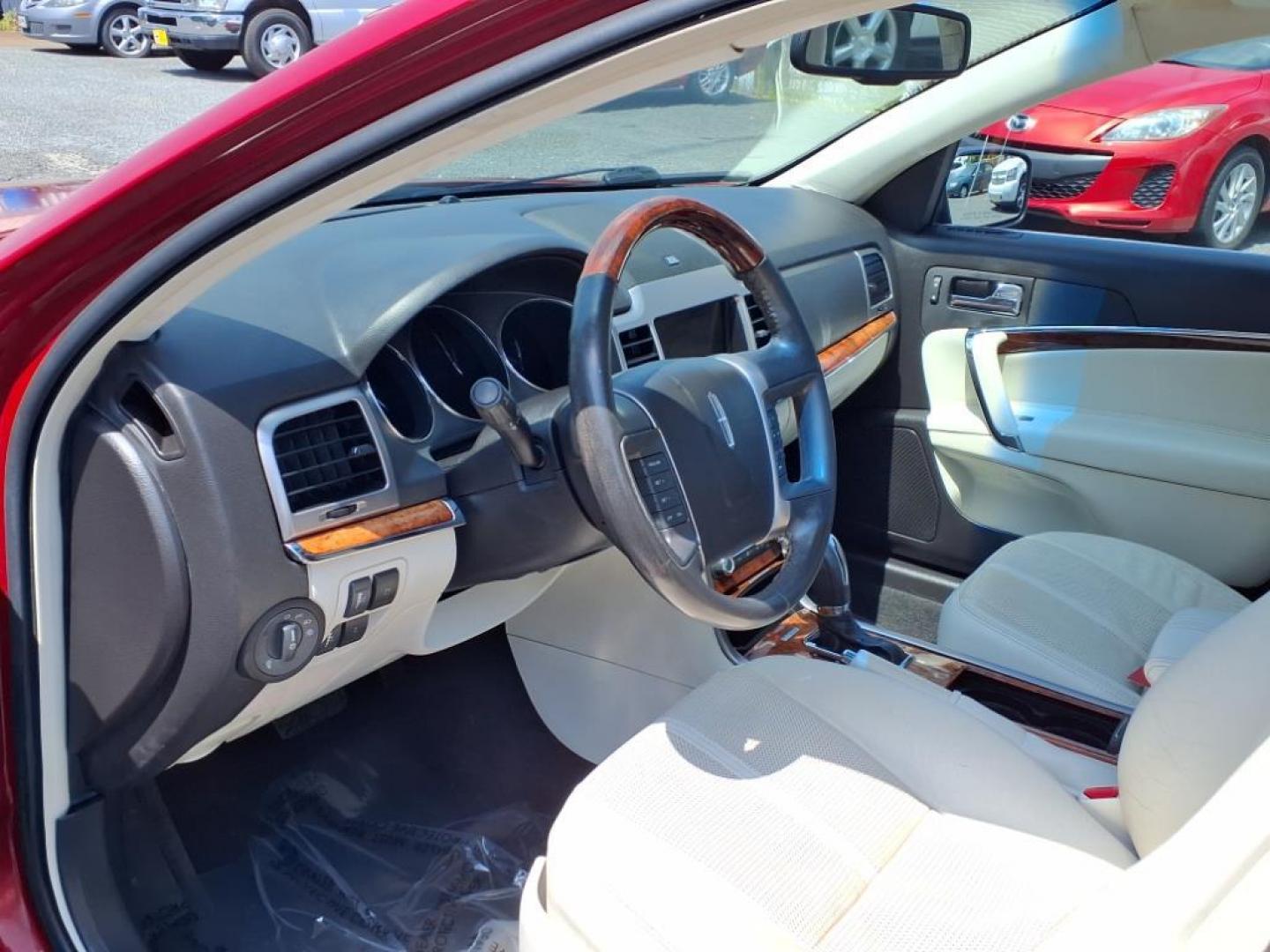 2010 Sangria Red Clearcoat Metallic Lincoln MKZ Base (3LNHL2JC6AR) with an 3.5L Duratec 3.5L V6 263hp 249ft. lbs. Sequential-Port F.I. engine, 6-Speed Shiftable Automatic transmission, located at 50 Eastern Blvd., Essex, MD, 21221, (410) 686-3444, 39.304367, -76.484947 - Photo#10