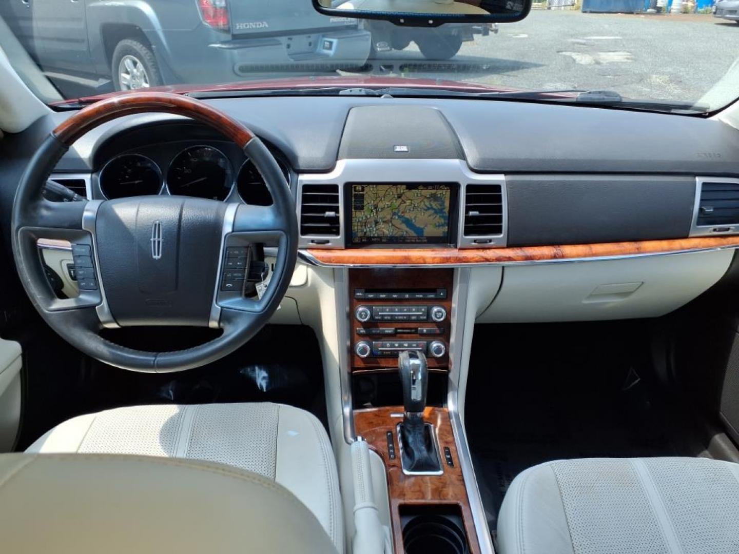 2010 Sangria Red Clearcoat Metallic Lincoln MKZ Base (3LNHL2JC6AR) with an 3.5L Duratec 3.5L V6 263hp 249ft. lbs. Sequential-Port F.I. engine, 6-Speed Shiftable Automatic transmission, located at 50 Eastern Blvd., Essex, MD, 21221, (410) 686-3444, 39.304367, -76.484947 - Photo#14