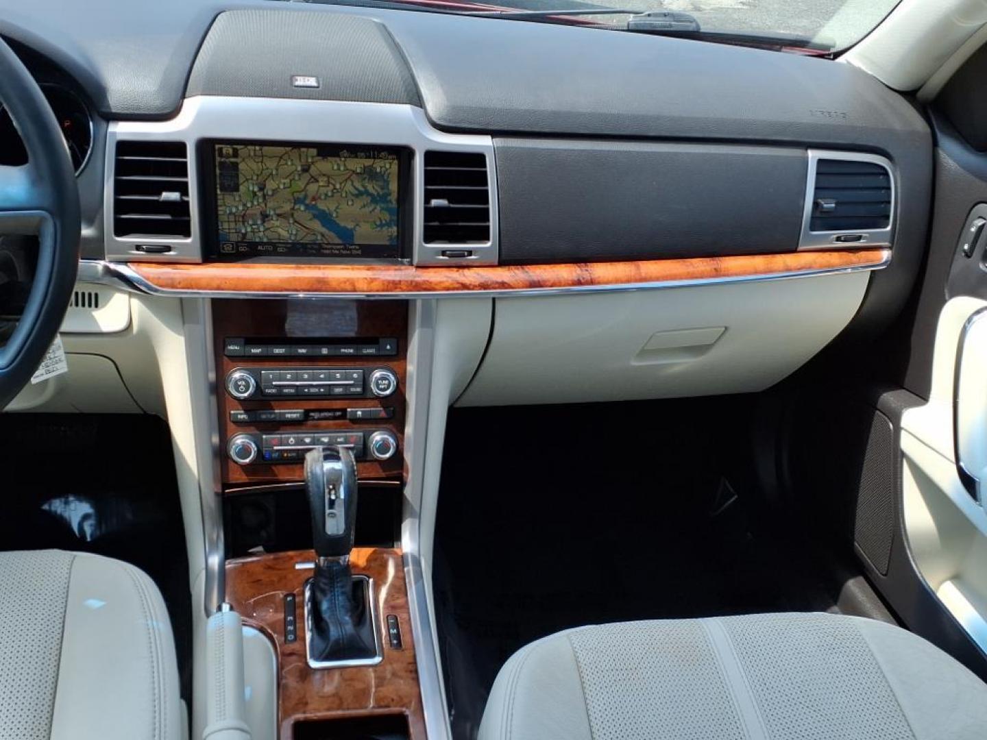 2010 Sangria Red Clearcoat Metallic Lincoln MKZ Base (3LNHL2JC6AR) with an 3.5L Duratec 3.5L V6 263hp 249ft. lbs. Sequential-Port F.I. engine, 6-Speed Shiftable Automatic transmission, located at 50 Eastern Blvd., Essex, MD, 21221, (410) 686-3444, 39.304367, -76.484947 - Photo#15