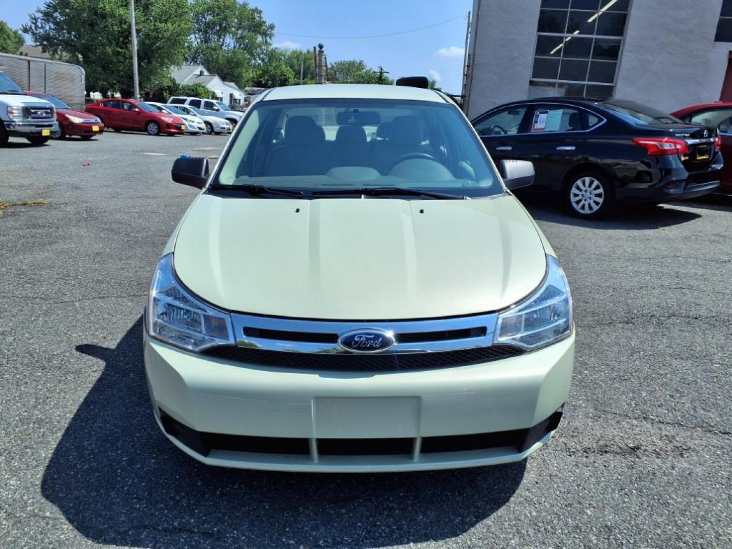 2010 Green Ford Focus SE (1FAHP3FN3AW) with an 2.0L 2.0L I4 140hp 136ft. lbs. Sequential-Port F.I. engine, Automatic transmission, located at 50 Eastern Blvd., Essex, MD, 21221, (410) 686-3444, 39.304367, -76.484947 - Photo#6