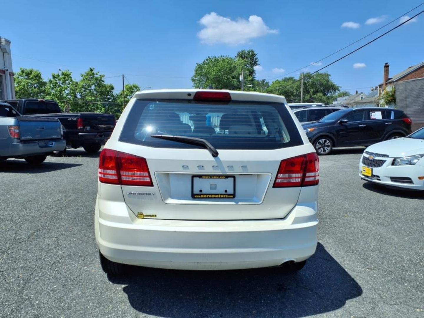 2013 Pearl White Tri-Coat Dodge Journey SE (3C4PDCAB1DT) with an 2.4L 2.4L I4 173hp 166ft. lbs. Sequential-Port F.I. engine, 4-Speed Shiftable Automatic transmission, located at 50 Eastern Blvd., Essex, MD, 21221, (410) 686-3444, 39.304367, -76.484947 - Photo#3