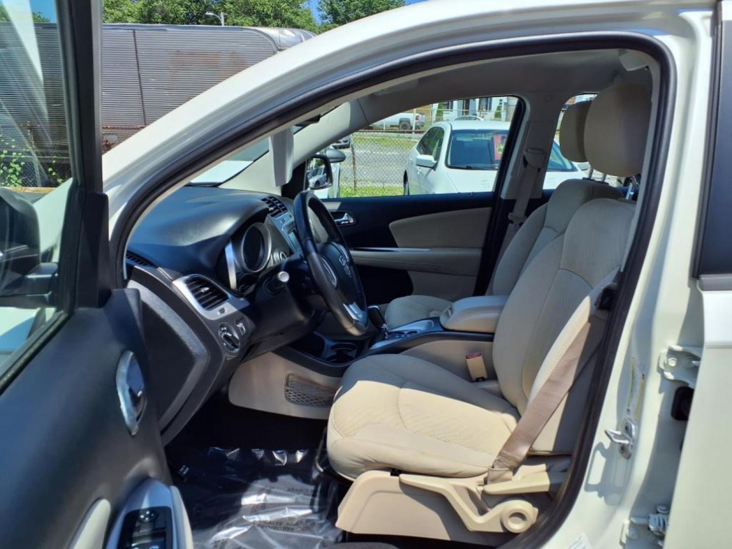 2013 Pearl White Tri-Coat Dodge Journey SE (3C4PDCAB1DT) with an 2.4L 2.4L I4 173hp 166ft. lbs. Sequential-Port F.I. engine, 4-Speed Shiftable Automatic transmission, located at 50 Eastern Blvd., Essex, MD, 21221, (410) 686-3444, 39.304367, -76.484947 - Photo#12