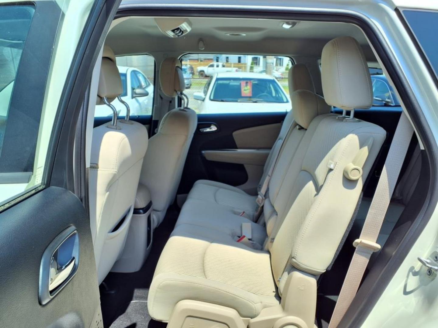 2013 Pearl White Tri-Coat Dodge Journey SE (3C4PDCAB1DT) with an 2.4L 2.4L I4 173hp 166ft. lbs. Sequential-Port F.I. engine, 4-Speed Shiftable Automatic transmission, located at 50 Eastern Blvd., Essex, MD, 21221, (410) 686-3444, 39.304367, -76.484947 - Photo#13