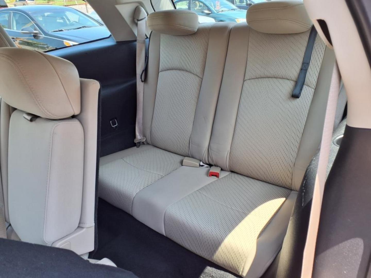2013 Pearl White Tri-Coat Dodge Journey SE (3C4PDCAB1DT) with an 2.4L 2.4L I4 173hp 166ft. lbs. Sequential-Port F.I. engine, 4-Speed Shiftable Automatic transmission, located at 50 Eastern Blvd., Essex, MD, 21221, (410) 686-3444, 39.304367, -76.484947 - Photo#14
