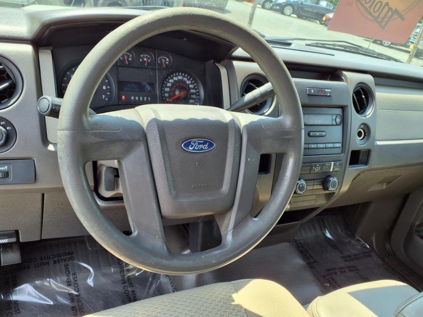 2010 Oxford White Ford F-150 XL (1FTMF1CW9AK) with an 4.6L 4.6L V8 248hp 294ft. lbs. Sequential-Port F.I. engine, 4-Speed Automatic transmission, located at 50 Eastern Blvd., Essex, MD, 21221, (410) 686-3444, 39.304367, -76.484947 - Photo#12