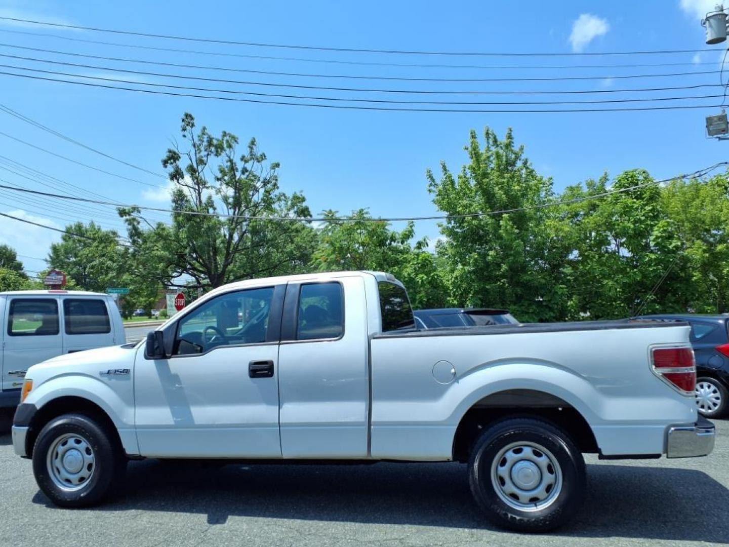 2011 Oxford White Ford F-150 XL (1FTEX1CMXBF) with an 3.7L 3.7L Flex Fuel V6 302hp 278ft. lbs. Sequential-Port F.I. engine, 6-Speed Automatic transmission, located at 50 Eastern Blvd., Essex, MD, 21221, (410) 686-3444, 39.304367, -76.484947 - Photo#1