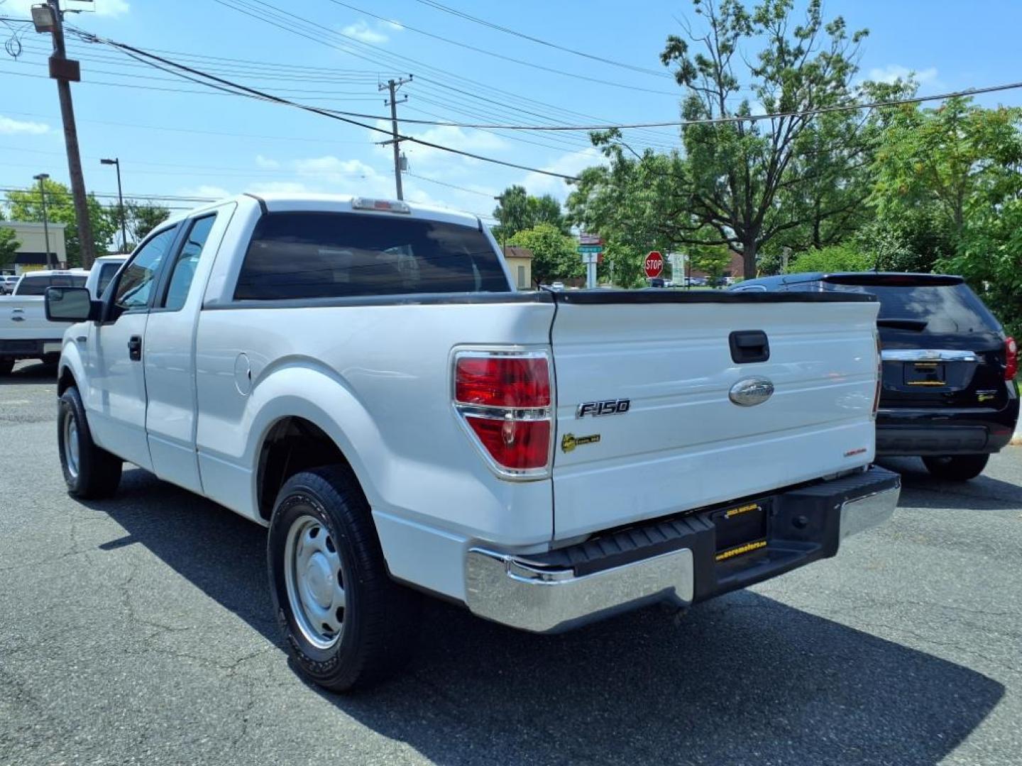 2011 Oxford White Ford F-150 XL (1FTEX1CMXBF) with an 3.7L 3.7L Flex Fuel V6 302hp 278ft. lbs. Sequential-Port F.I. engine, 6-Speed Automatic transmission, located at 50 Eastern Blvd., Essex, MD, 21221, (410) 686-3444, 39.304367, -76.484947 - Photo#2