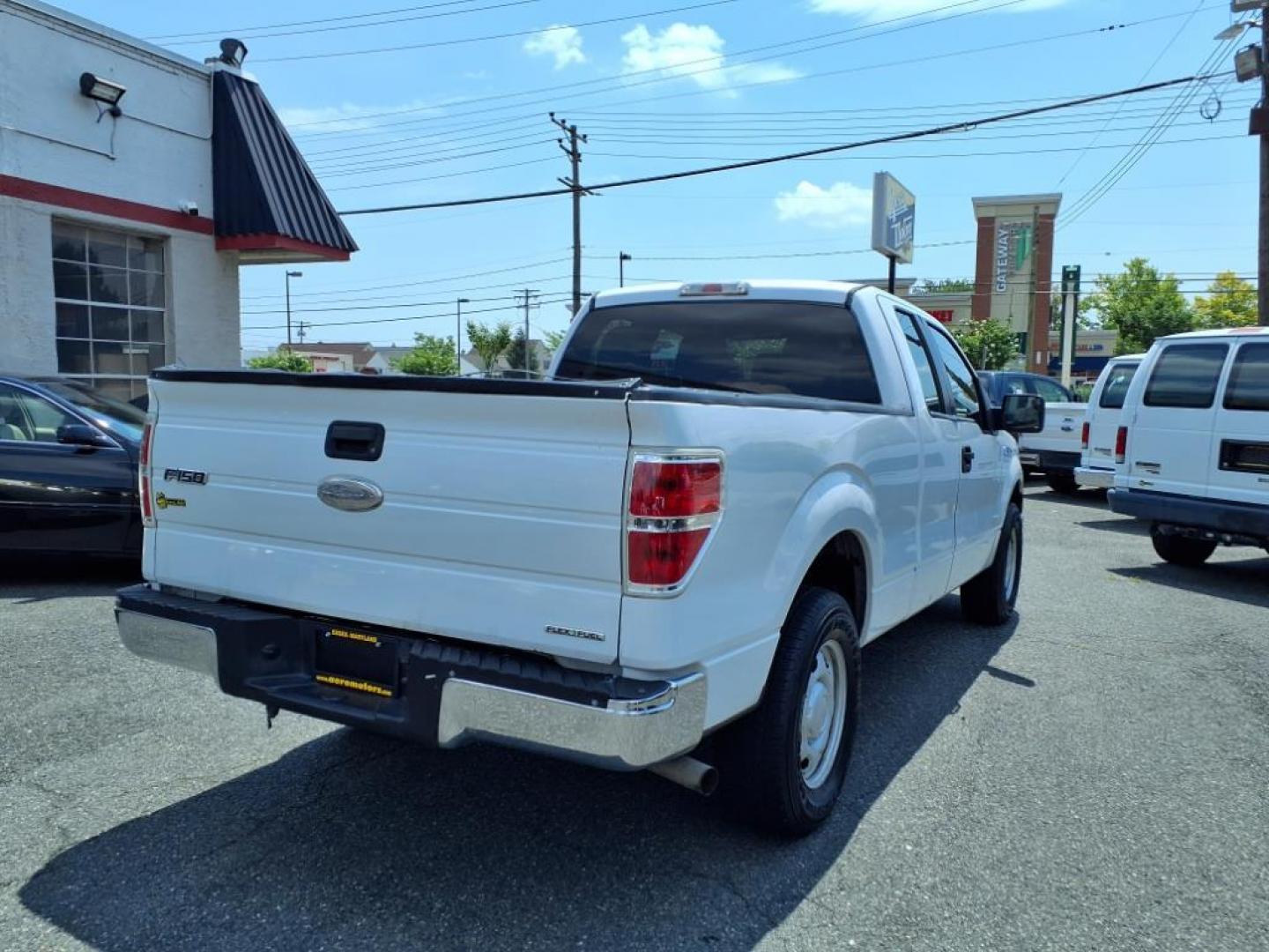 2011 Oxford White Ford F-150 XL (1FTEX1CMXBF) with an 3.7L 3.7L Flex Fuel V6 302hp 278ft. lbs. Sequential-Port F.I. engine, 6-Speed Automatic transmission, located at 50 Eastern Blvd., Essex, MD, 21221, (410) 686-3444, 39.304367, -76.484947 - Photo#4