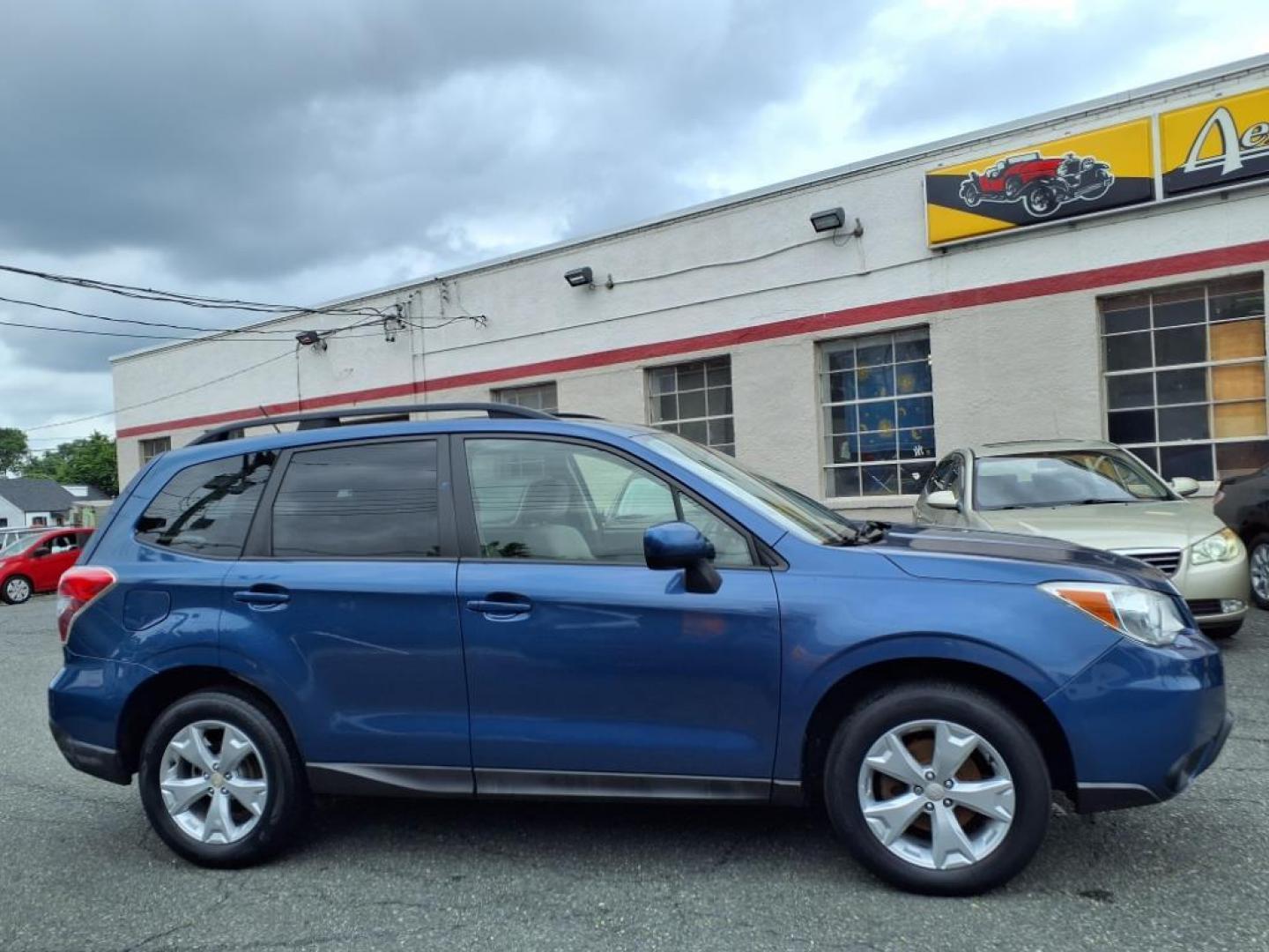 2014 Marine Blue Pearl Subaru Forester 2.5i Premium (JF2SJAEC4EH) with an 2.5L 2.5L H4 170hp 174ft. lbs. Sequential-Port F.I. engine, CVT transmission, located at 50 Eastern Blvd., Essex, MD, 21221, (410) 686-3444, 39.304367, -76.484947 - Photo#6
