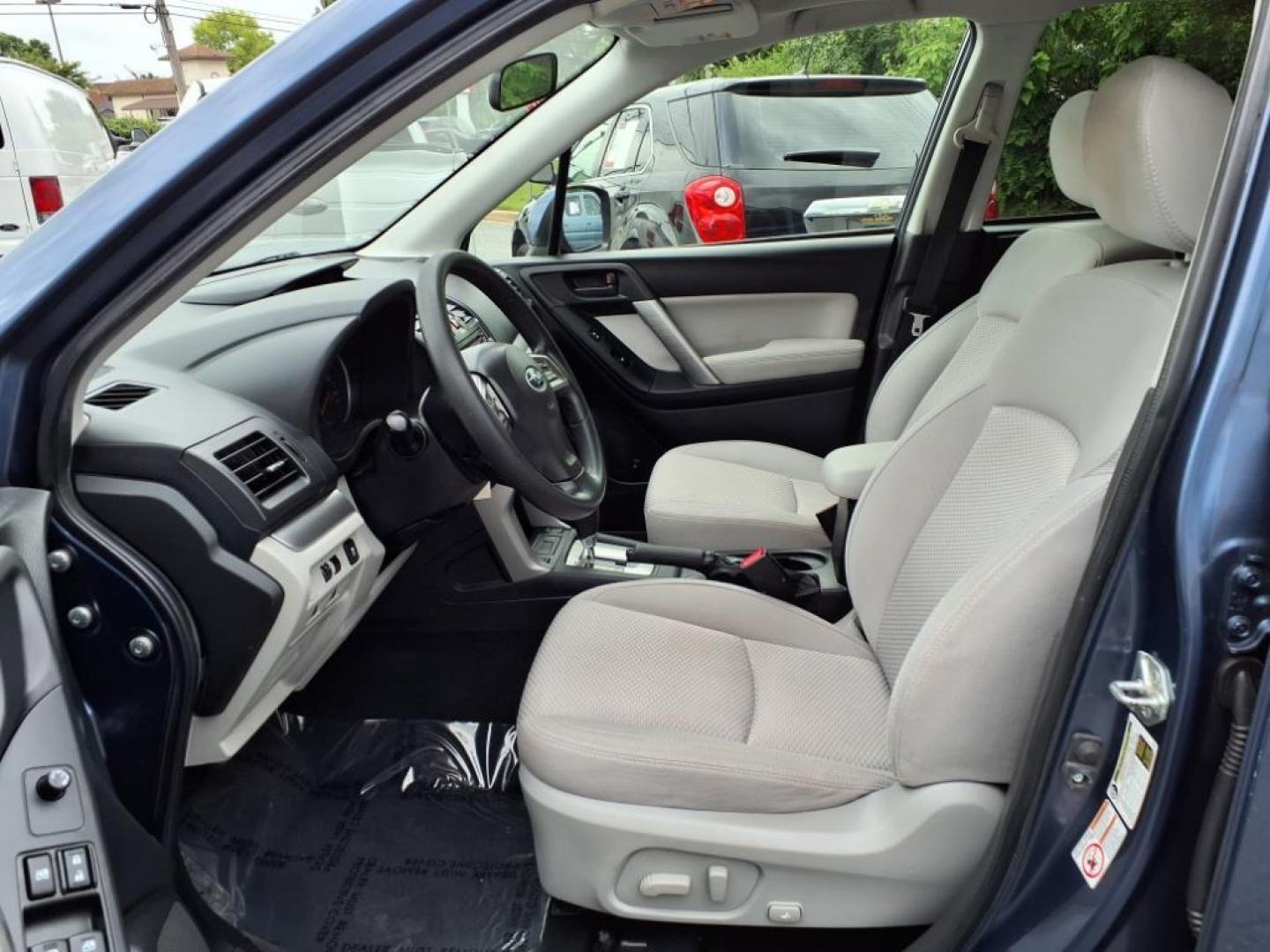 2014 Marine Blue Pearl Subaru Forester 2.5i Premium (JF2SJAEC4EH) with an 2.5L 2.5L H4 170hp 174ft. lbs. Sequential-Port F.I. engine, CVT transmission, located at 50 Eastern Blvd., Essex, MD, 21221, (410) 686-3444, 39.304367, -76.484947 - Photo#12