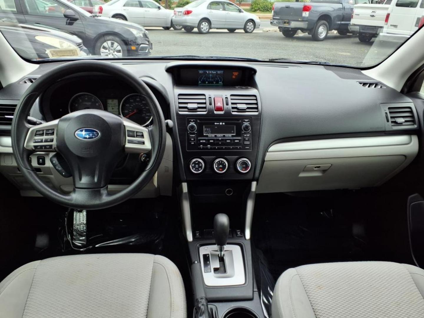 2014 Marine Blue Pearl Subaru Forester 2.5i Premium (JF2SJAEC4EH) with an 2.5L 2.5L H4 170hp 174ft. lbs. Sequential-Port F.I. engine, CVT transmission, located at 50 Eastern Blvd., Essex, MD, 21221, (410) 686-3444, 39.304367, -76.484947 - Photo#15