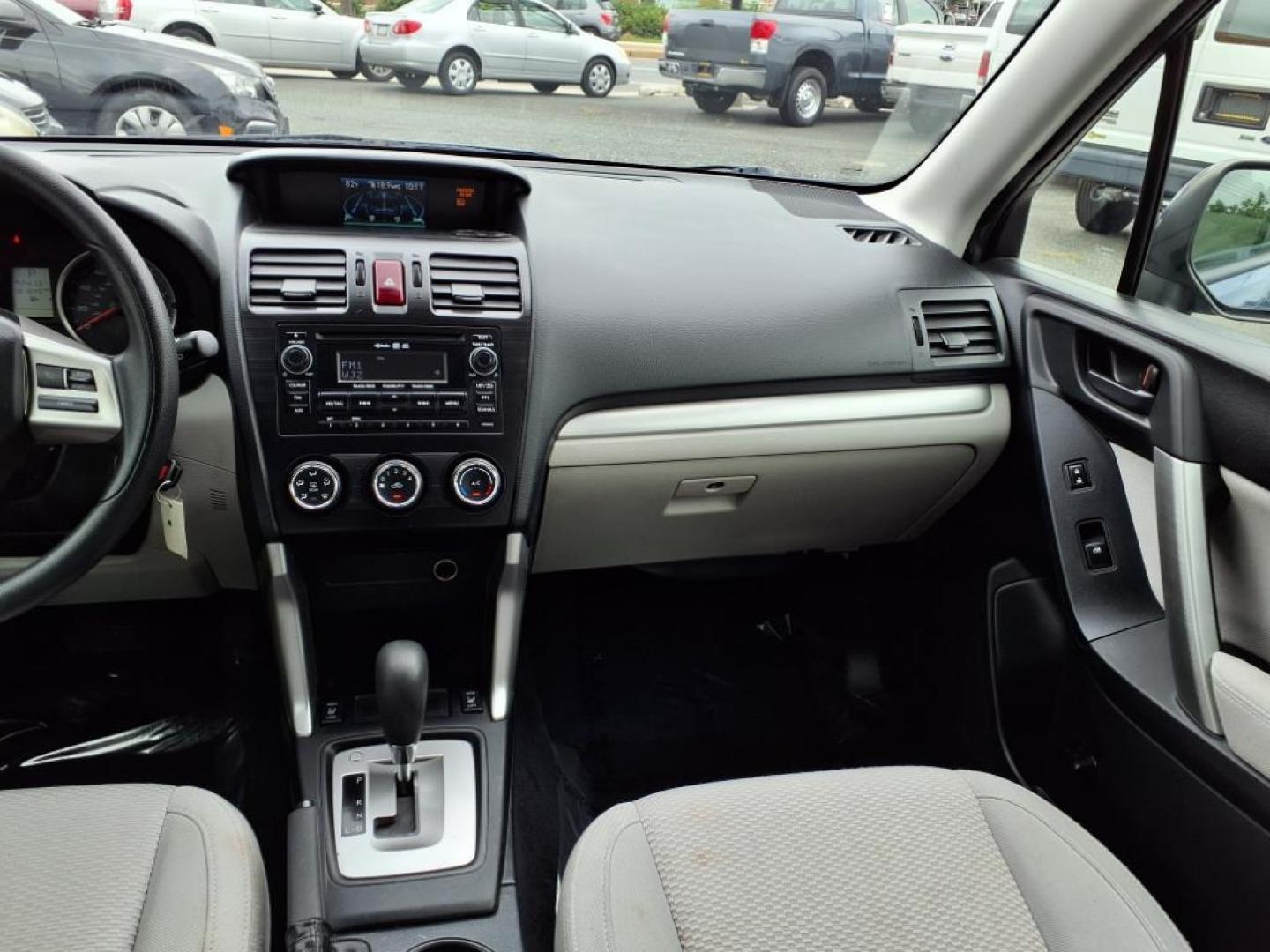 2014 Marine Blue Pearl Subaru Forester 2.5i Premium (JF2SJAEC4EH) with an 2.5L 2.5L H4 170hp 174ft. lbs. Sequential-Port F.I. engine, CVT transmission, located at 50 Eastern Blvd., Essex, MD, 21221, (410) 686-3444, 39.304367, -76.484947 - Photo#16