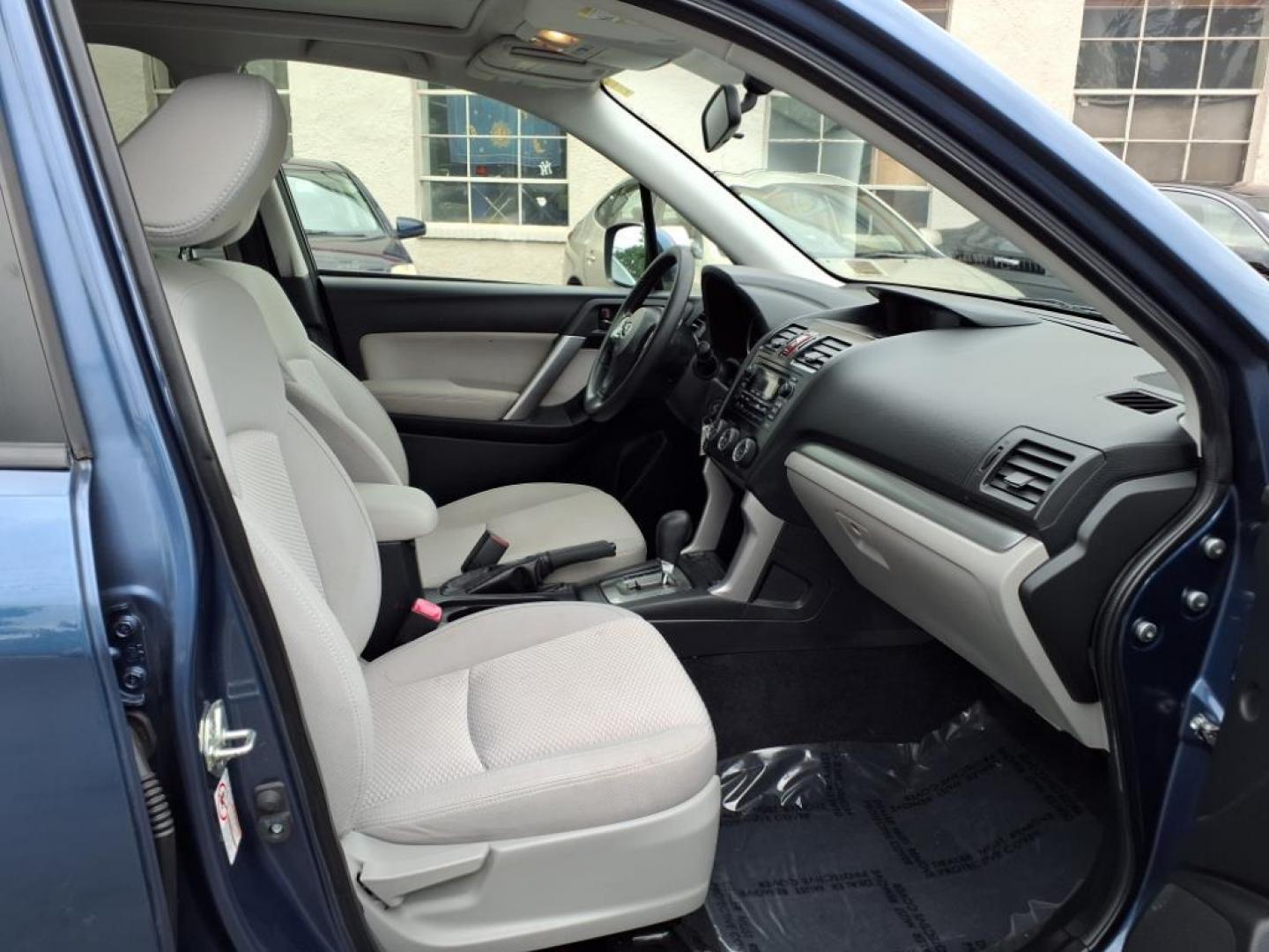 2014 Marine Blue Pearl Subaru Forester 2.5i Premium (JF2SJAEC4EH) with an 2.5L 2.5L H4 170hp 174ft. lbs. Sequential-Port F.I. engine, CVT transmission, located at 50 Eastern Blvd., Essex, MD, 21221, (410) 686-3444, 39.304367, -76.484947 - Photo#18