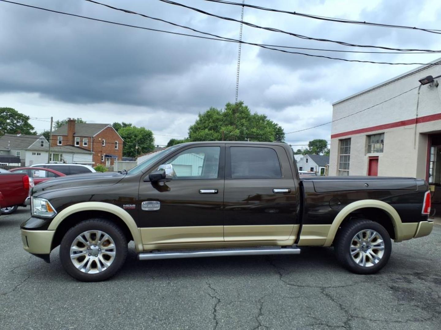 2013 Mineral Gray Metallic Clear Coat RAM 1500 Laramie Longhorn (1C6RR7WT7DS) with an 5.7L HEMI 5.7L V8 395hp 407ft. lbs. Sequential-Port F.I. engine, Automatic transmission, located at 50 Eastern Blvd., Essex, MD, 21221, (410) 686-3444, 39.304367, -76.484947 - Photo#1