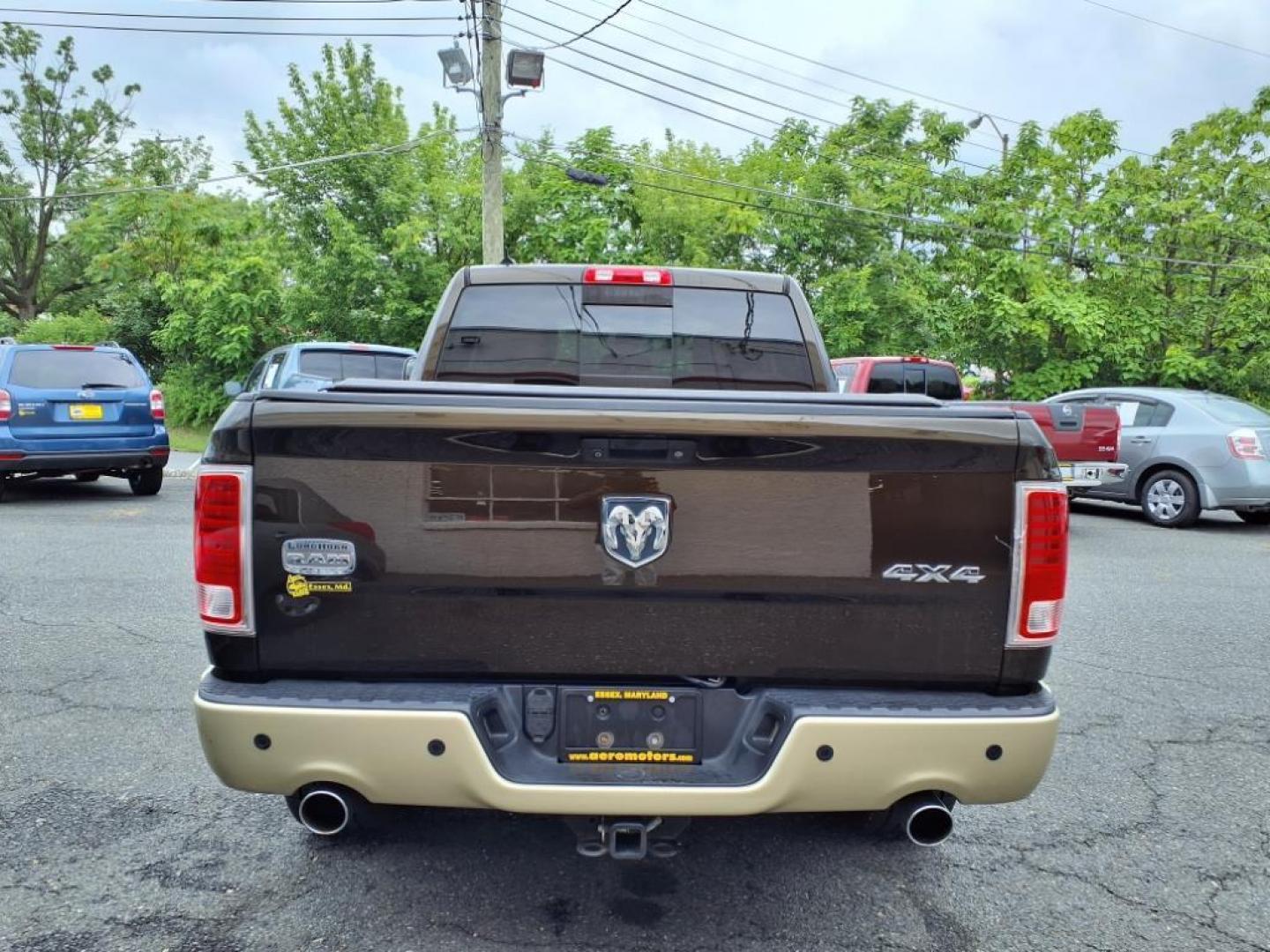 2013 Mineral Gray Metallic Clear Coat RAM 1500 Laramie Longhorn (1C6RR7WT7DS) with an 5.7L HEMI 5.7L V8 395hp 407ft. lbs. Sequential-Port F.I. engine, Automatic transmission, located at 50 Eastern Blvd., Essex, MD, 21221, (410) 686-3444, 39.304367, -76.484947 - Photo#2