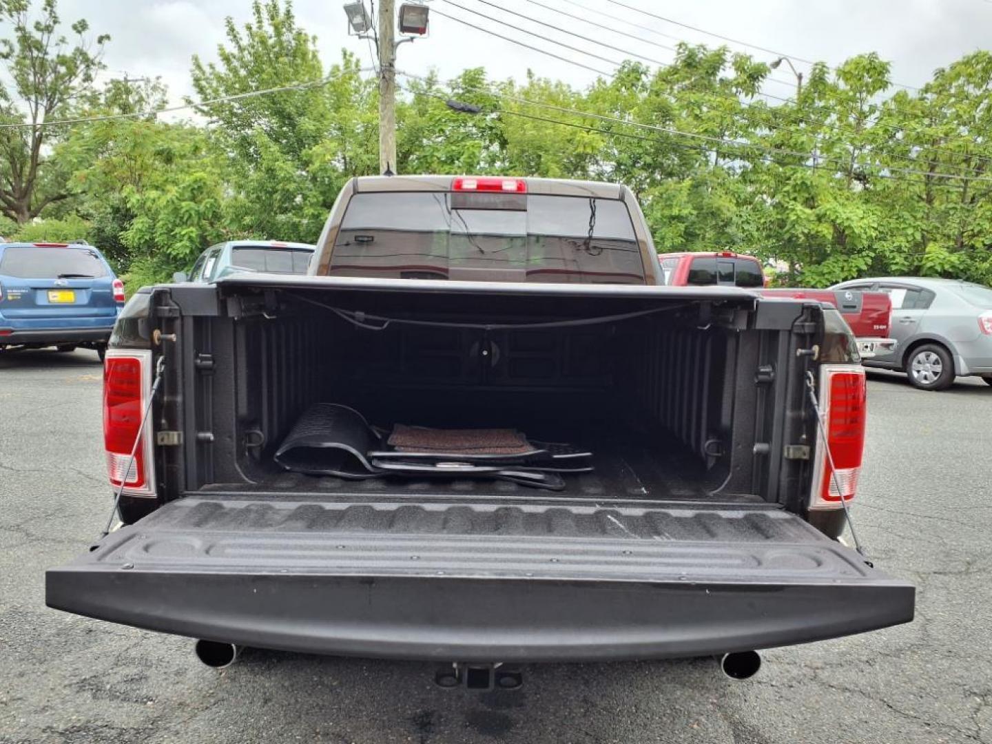 2013 Mineral Gray Metallic Clear Coat RAM 1500 Laramie Longhorn (1C6RR7WT7DS) with an 5.7L HEMI 5.7L V8 395hp 407ft. lbs. Sequential-Port F.I. engine, Automatic transmission, located at 50 Eastern Blvd., Essex, MD, 21221, (410) 686-3444, 39.304367, -76.484947 - Photo#3
