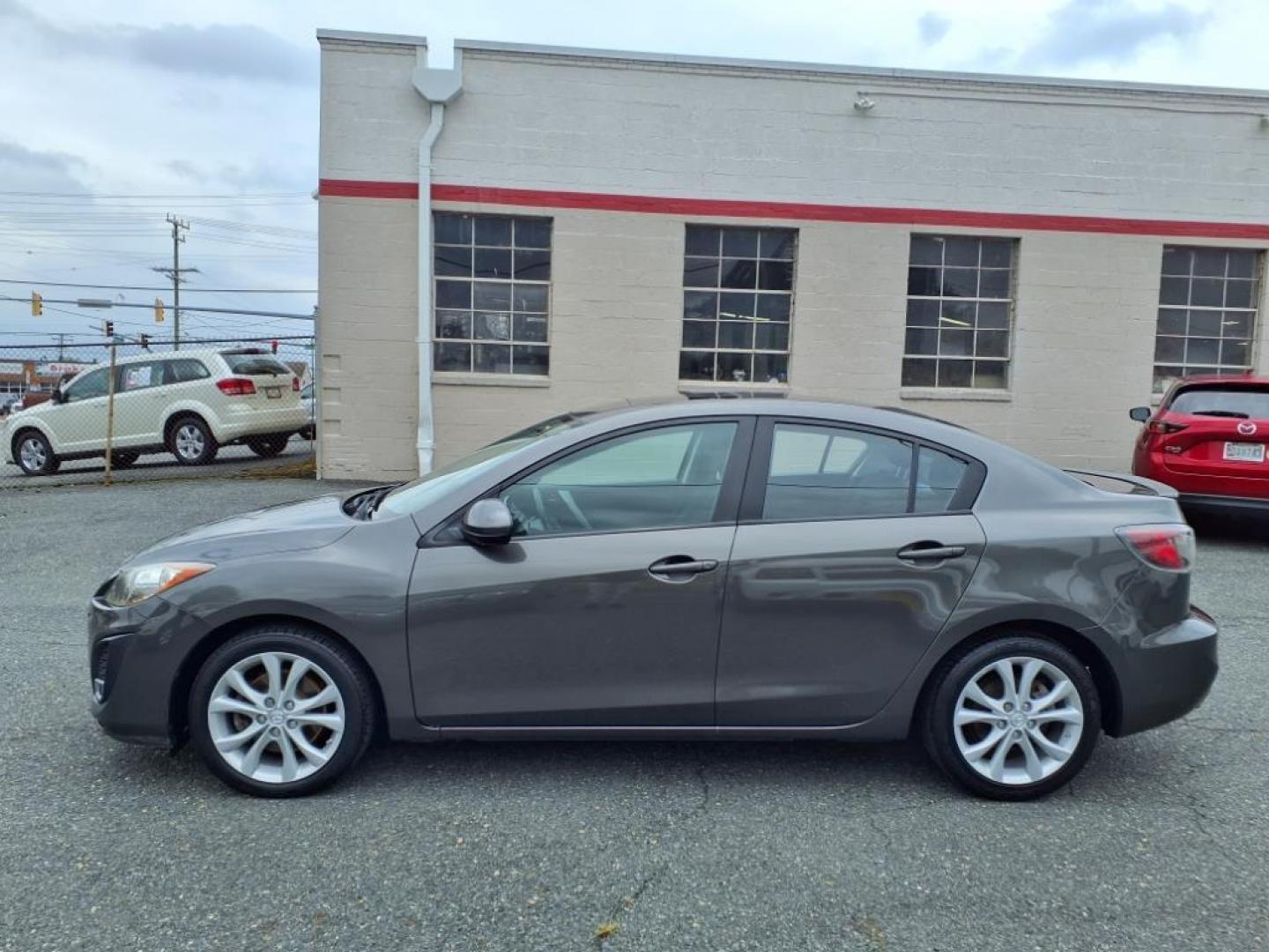 2011 Gray Mazda Mazda3 s Sport (JM1BL1U66B1) with an 2.5L 2.5L I4 165hp 167ft. lbs. PZEV Sequential-Port F.I. engine, 5-Speed Automatic with Sportshift Manual 5A transmission, located at 50 Eastern Blvd., Essex, MD, 21221, (410) 686-3444, 39.304367, -76.484947 - Photo#1