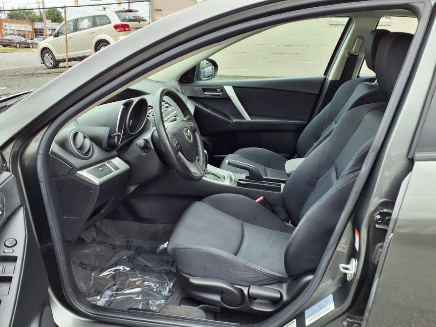 2011 Gray Mazda Mazda3 s Sport (JM1BL1U66B1) with an 2.5L 2.5L I4 165hp 167ft. lbs. PZEV Sequential-Port F.I. engine, 5-Speed Automatic with Sportshift Manual 5A transmission, located at 50 Eastern Blvd., Essex, MD, 21221, (410) 686-3444, 39.304367, -76.484947 - Photo#11