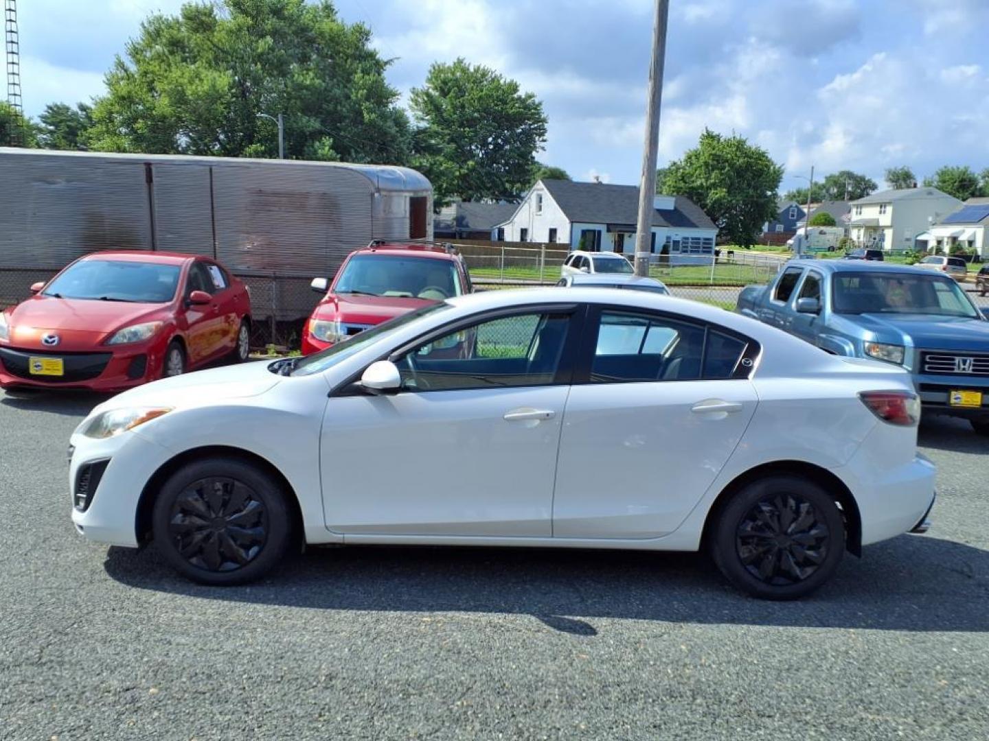 2011 Crystal White Pearl Mazda Mazda3 i Sport (JM1BL1UG2B1) with an 2.0L 2.0L I4 144hp 132ft. lbs. PZEV Sequential-Port F.I. engine, 5-Speed Automatic with Sportshift Manual 5A transmission, located at 50 Eastern Blvd., Essex, MD, 21221, (410) 686-3444, 39.304367, -76.484947 - Photo#1