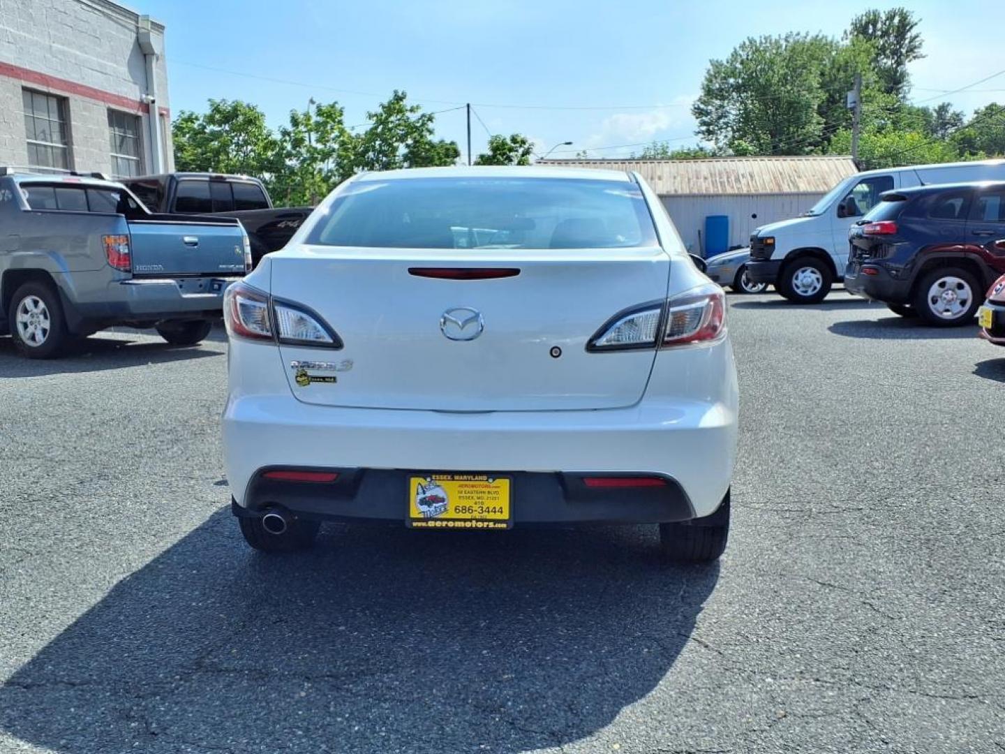 2011 Crystal White Pearl Mazda Mazda3 i Sport (JM1BL1UG2B1) with an 2.0L 2.0L I4 144hp 132ft. lbs. PZEV Sequential-Port F.I. engine, 5-Speed Automatic with Sportshift Manual 5A transmission, located at 50 Eastern Blvd., Essex, MD, 21221, (410) 686-3444, 39.304367, -76.484947 - Photo#3