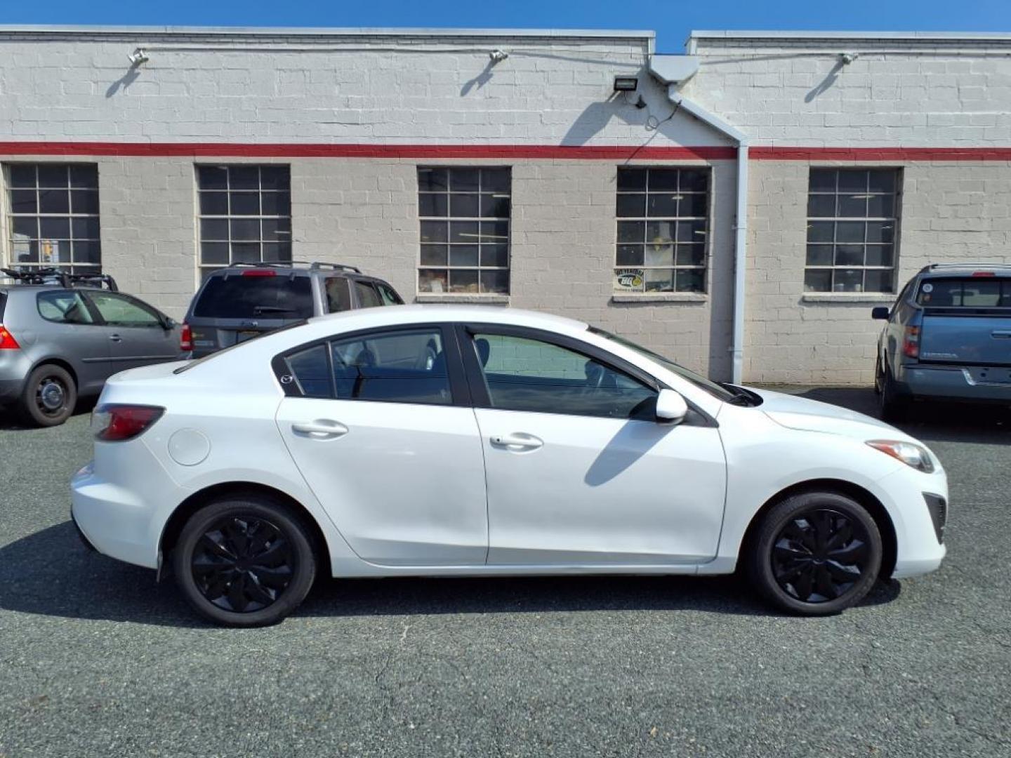 2011 Crystal White Pearl Mazda Mazda3 i Sport (JM1BL1UG2B1) with an 2.0L 2.0L I4 144hp 132ft. lbs. PZEV Sequential-Port F.I. engine, 5-Speed Automatic with Sportshift Manual 5A transmission, located at 50 Eastern Blvd., Essex, MD, 21221, (410) 686-3444, 39.304367, -76.484947 - Photo#5