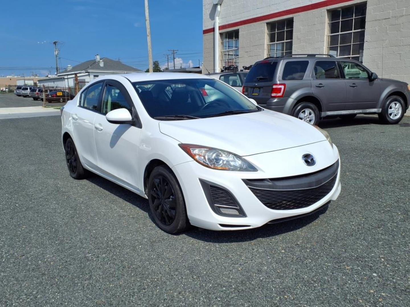 2011 Crystal White Pearl Mazda Mazda3 i Sport (JM1BL1UG2B1) with an 2.0L 2.0L I4 144hp 132ft. lbs. PZEV Sequential-Port F.I. engine, 5-Speed Automatic with Sportshift Manual 5A transmission, located at 50 Eastern Blvd., Essex, MD, 21221, (410) 686-3444, 39.304367, -76.484947 - Photo#6
