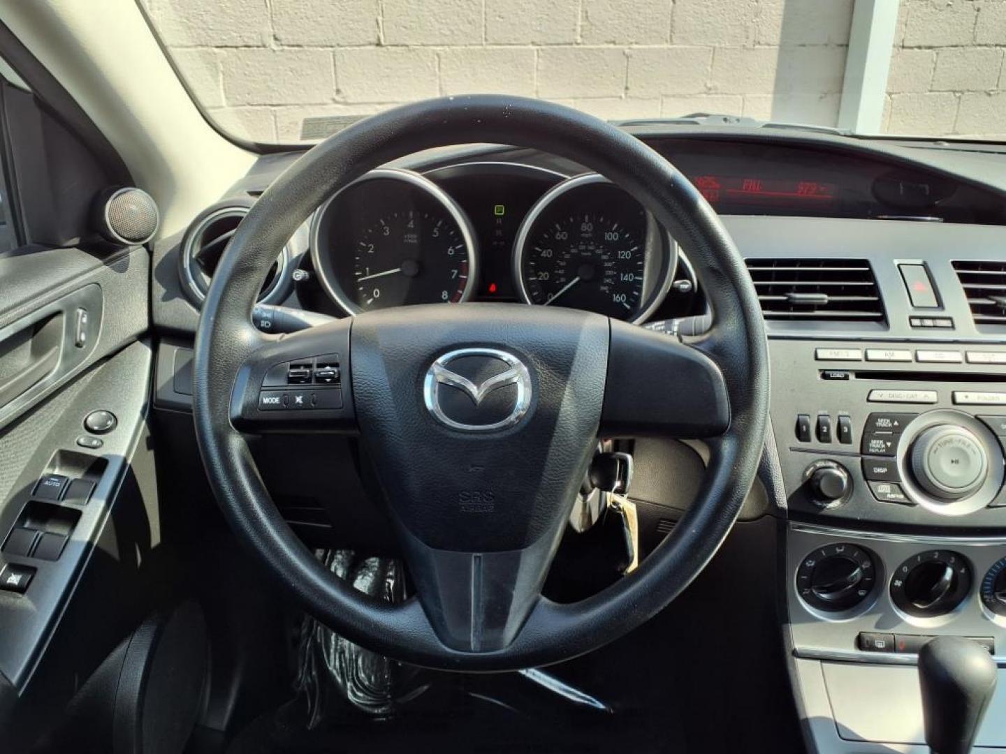 2011 Crystal White Pearl Mazda Mazda3 i Sport (JM1BL1UG2B1) with an 2.0L 2.0L I4 144hp 132ft. lbs. PZEV Sequential-Port F.I. engine, 5-Speed Automatic with Sportshift Manual 5A transmission, located at 50 Eastern Blvd., Essex, MD, 21221, (410) 686-3444, 39.304367, -76.484947 - Photo#13