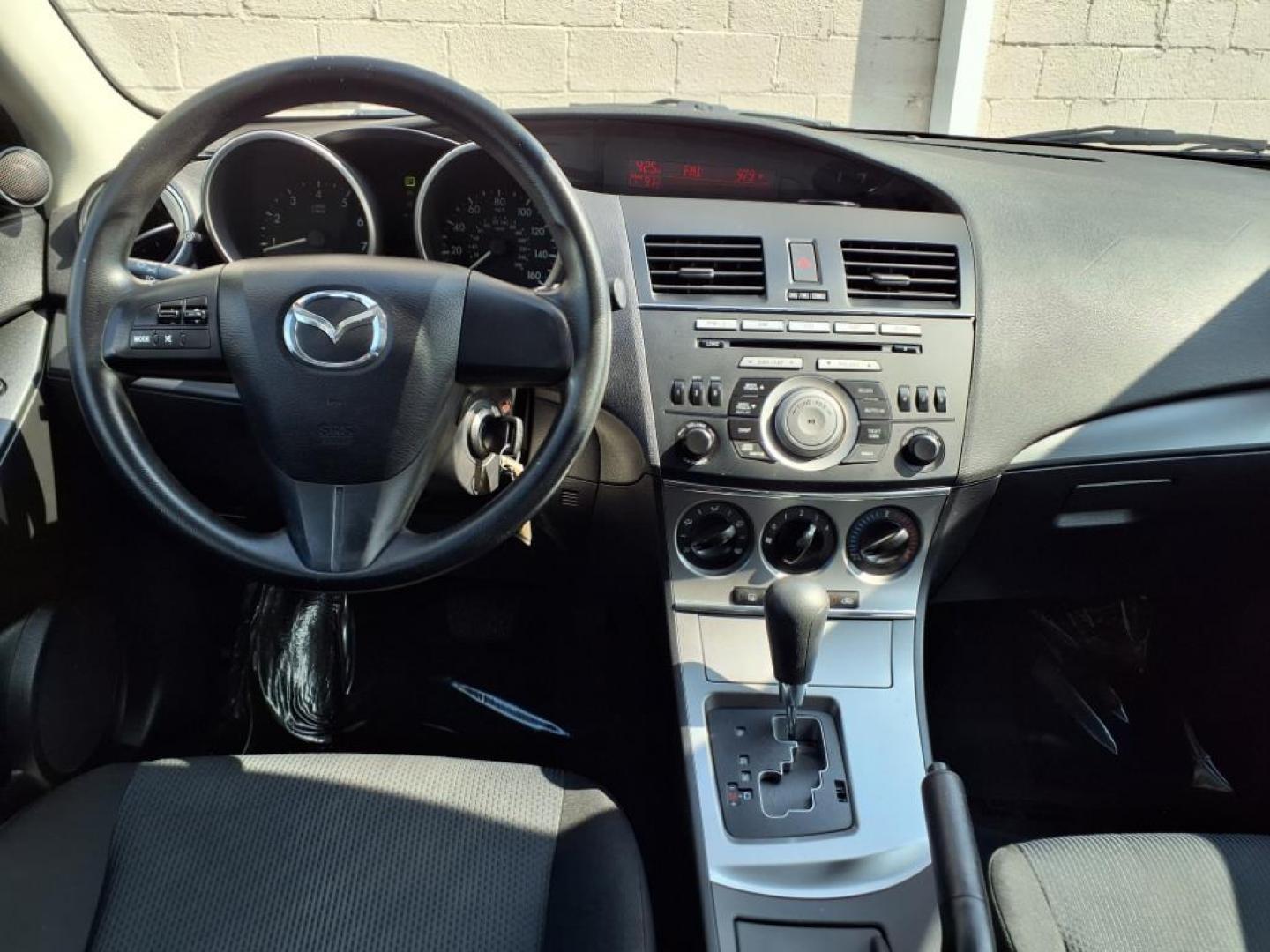 2011 Crystal White Pearl Mazda Mazda3 i Sport (JM1BL1UG2B1) with an 2.0L 2.0L I4 144hp 132ft. lbs. PZEV Sequential-Port F.I. engine, 5-Speed Automatic with Sportshift Manual 5A transmission, located at 50 Eastern Blvd., Essex, MD, 21221, (410) 686-3444, 39.304367, -76.484947 - Photo#14