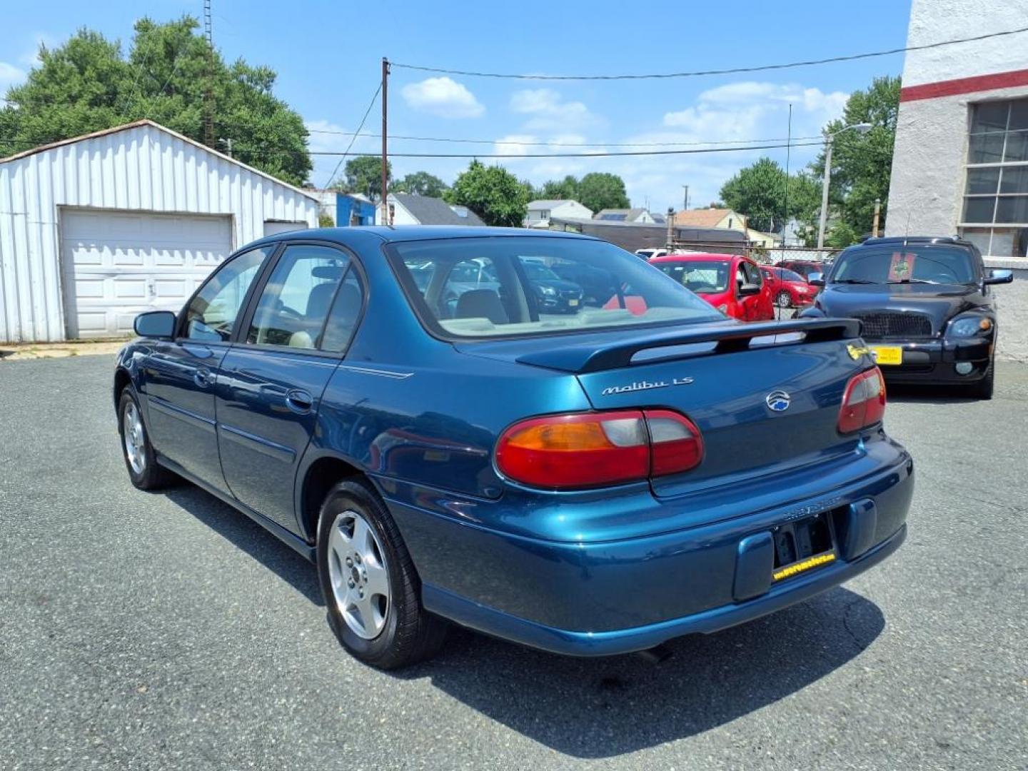 2003 Blue Chevrolet Malibu LS (1G1NE52J03M) with an 3.1L 6 Cylinder Fuel Injected engine, 4CYL transmission, located at 50 Eastern Blvd., Essex, MD, 21221, (410) 686-3444, 39.304367, -76.484947 - Photo#2