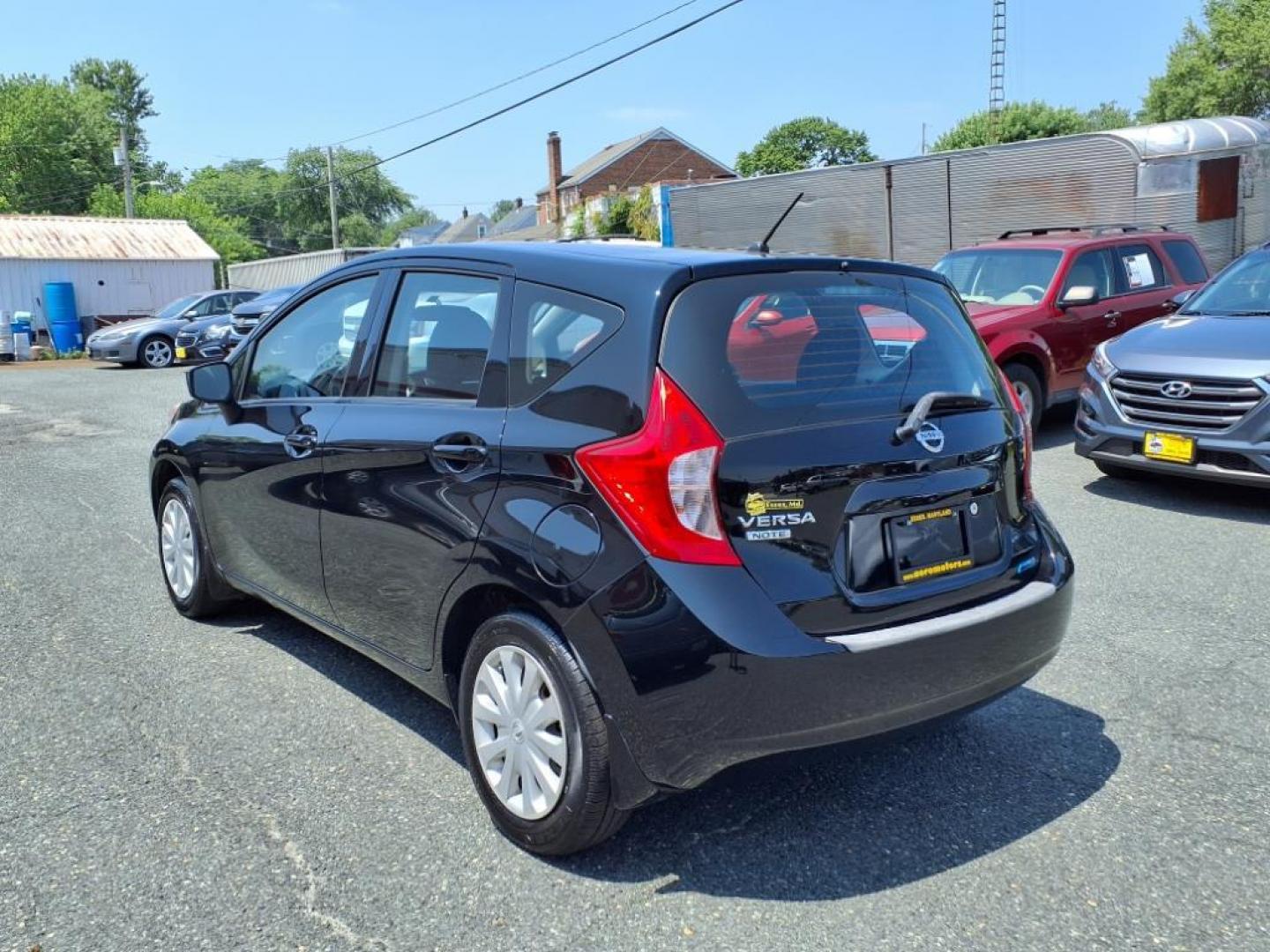 2015 Super Black Nissan Versa Note S Plus (3N1CE2CP1FL) with an 1.6L 4 Cylinder Sequential-Port F.I. engine, 4CYL transmission, located at 50 Eastern Blvd., Essex, MD, 21221, (410) 686-3444, 39.304367, -76.484947 - Photo#2