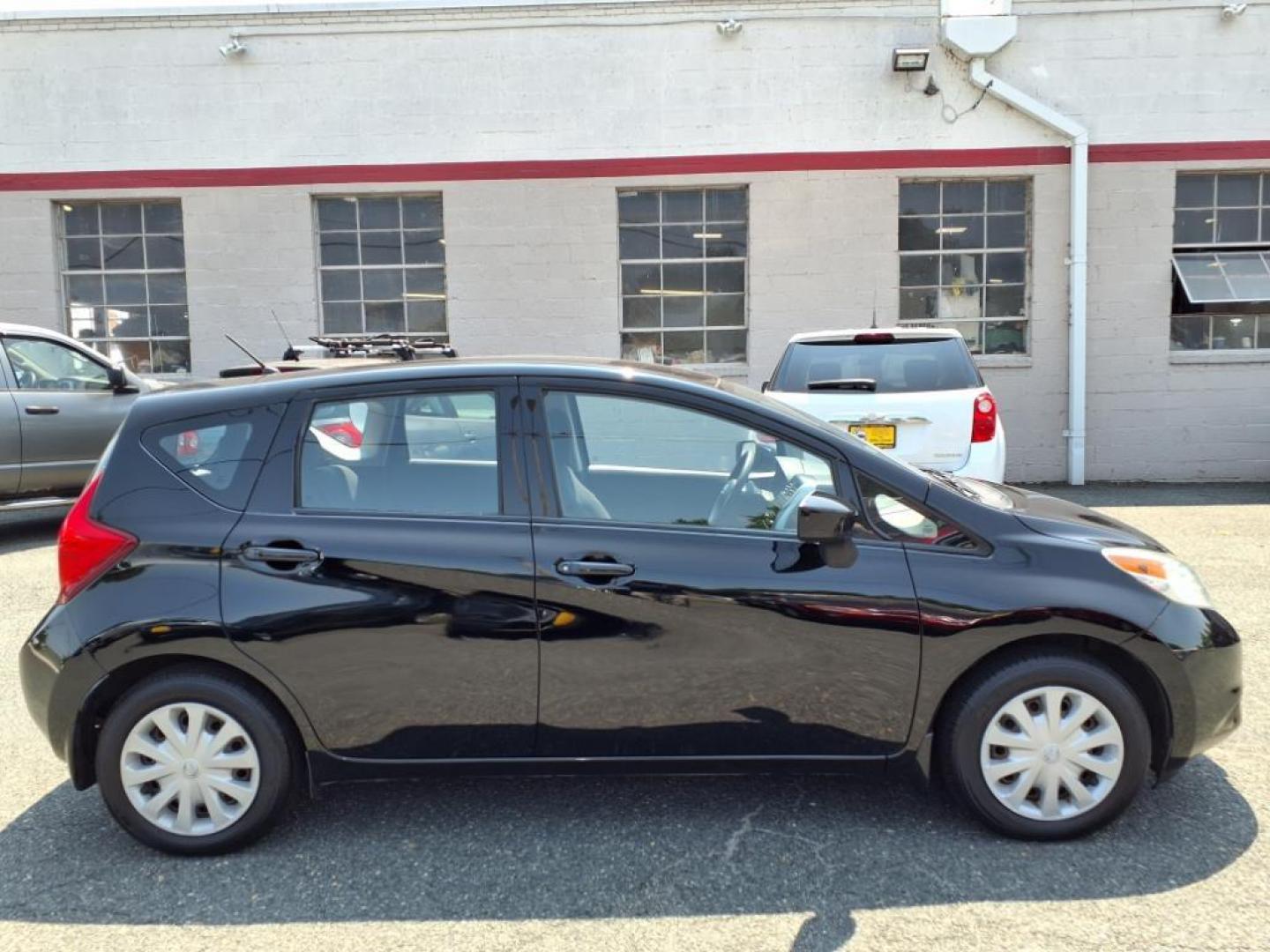 2015 Super Black Nissan Versa Note S Plus (3N1CE2CP1FL) with an 1.6L 4 Cylinder Sequential-Port F.I. engine, 4CYL transmission, located at 50 Eastern Blvd., Essex, MD, 21221, (410) 686-3444, 39.304367, -76.484947 - Photo#6