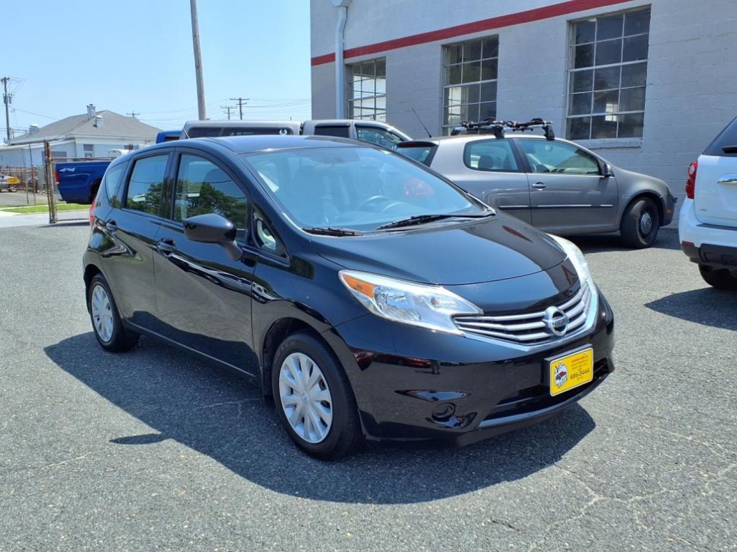 2015 Super Black Nissan Versa Note S Plus (3N1CE2CP1FL) with an 1.6L 4 Cylinder Sequential-Port F.I. engine, 4CYL transmission, located at 50 Eastern Blvd., Essex, MD, 21221, (410) 686-3444, 39.304367, -76.484947 - Photo#7