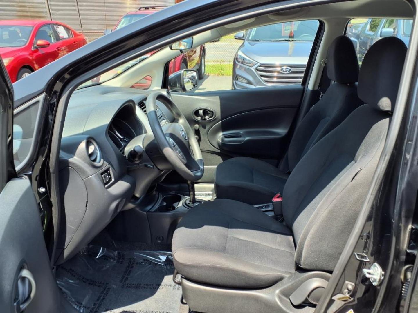2015 Super Black Nissan Versa Note S Plus (3N1CE2CP1FL) with an 1.6L 4 Cylinder Sequential-Port F.I. engine, 4CYL transmission, located at 50 Eastern Blvd., Essex, MD, 21221, (410) 686-3444, 39.304367, -76.484947 - Photo#12