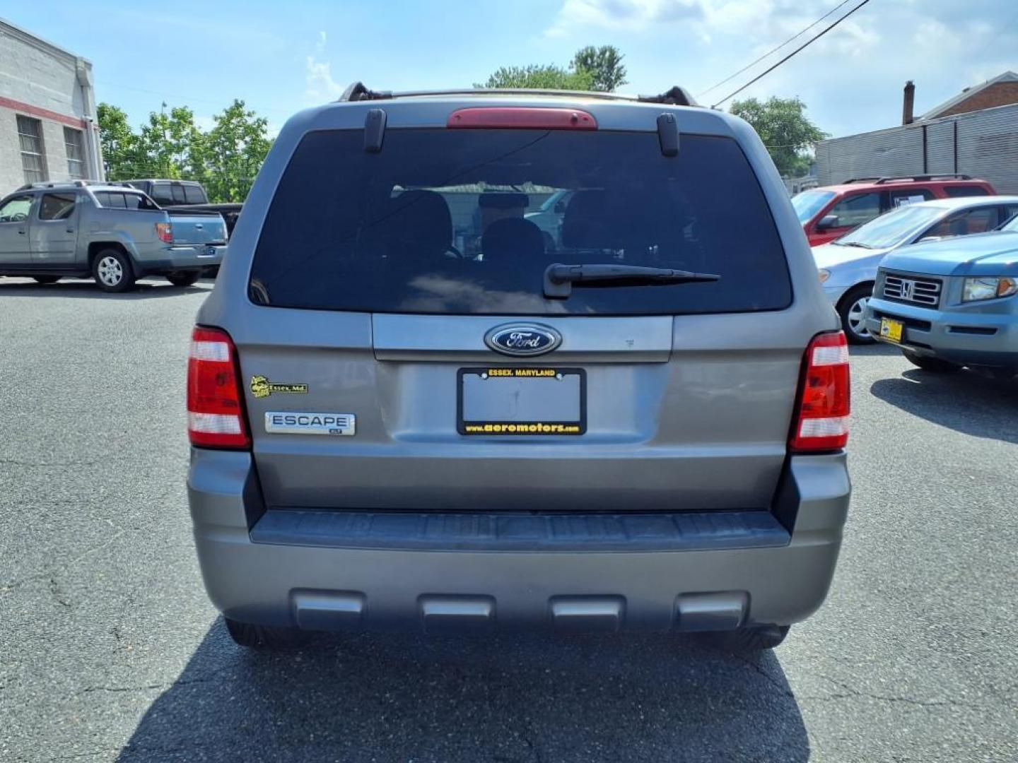 2009 Sterling Gray Clearcoat Metallic Ford Escape XLT (1FMCU03749K) with an 2.5L Duratec 2.5L I4 171hp 171ft. lbs. Sequential-Port F.I. engine, 6-Speed Automatic transmission, located at 50 Eastern Blvd., Essex, MD, 21221, (410) 686-3444, 39.304367, -76.484947 - Photo#3