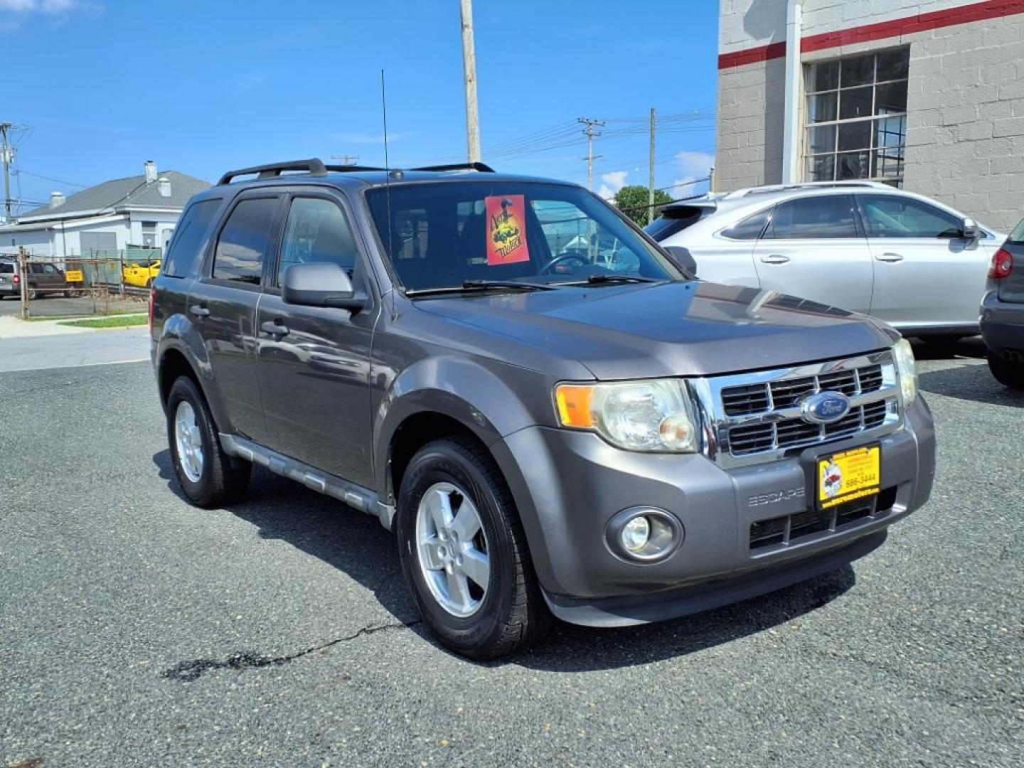 2009 Sterling Gray Clearcoat Metallic Ford Escape XLT (1FMCU03749K) with an 2.5L Duratec 2.5L I4 171hp 171ft. lbs. Sequential-Port F.I. engine, 6-Speed Automatic transmission, located at 50 Eastern Blvd., Essex, MD, 21221, (410) 686-3444, 39.304367, -76.484947 - Photo#7